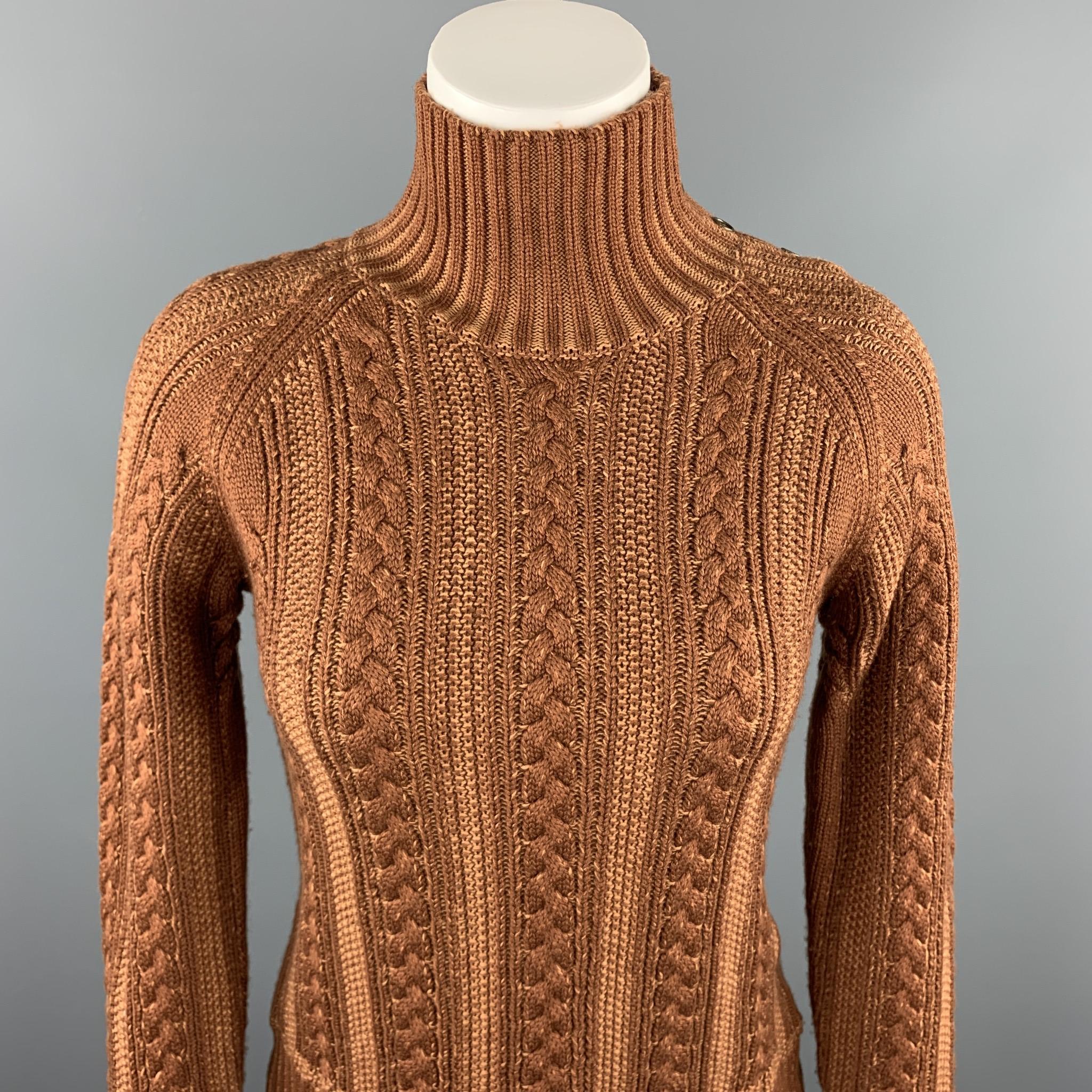 BURBERRY sweater comes in a brown cable knit wool / cotton featuring a high collar and a side button detail.

Excellent Pre-Owned Condition.
Marked: No size marked

Measurements:

Shoulder: 16.5 in. 
Bust: 32 in. 
Sleeve: 24 in. 
Length: 20 in. 