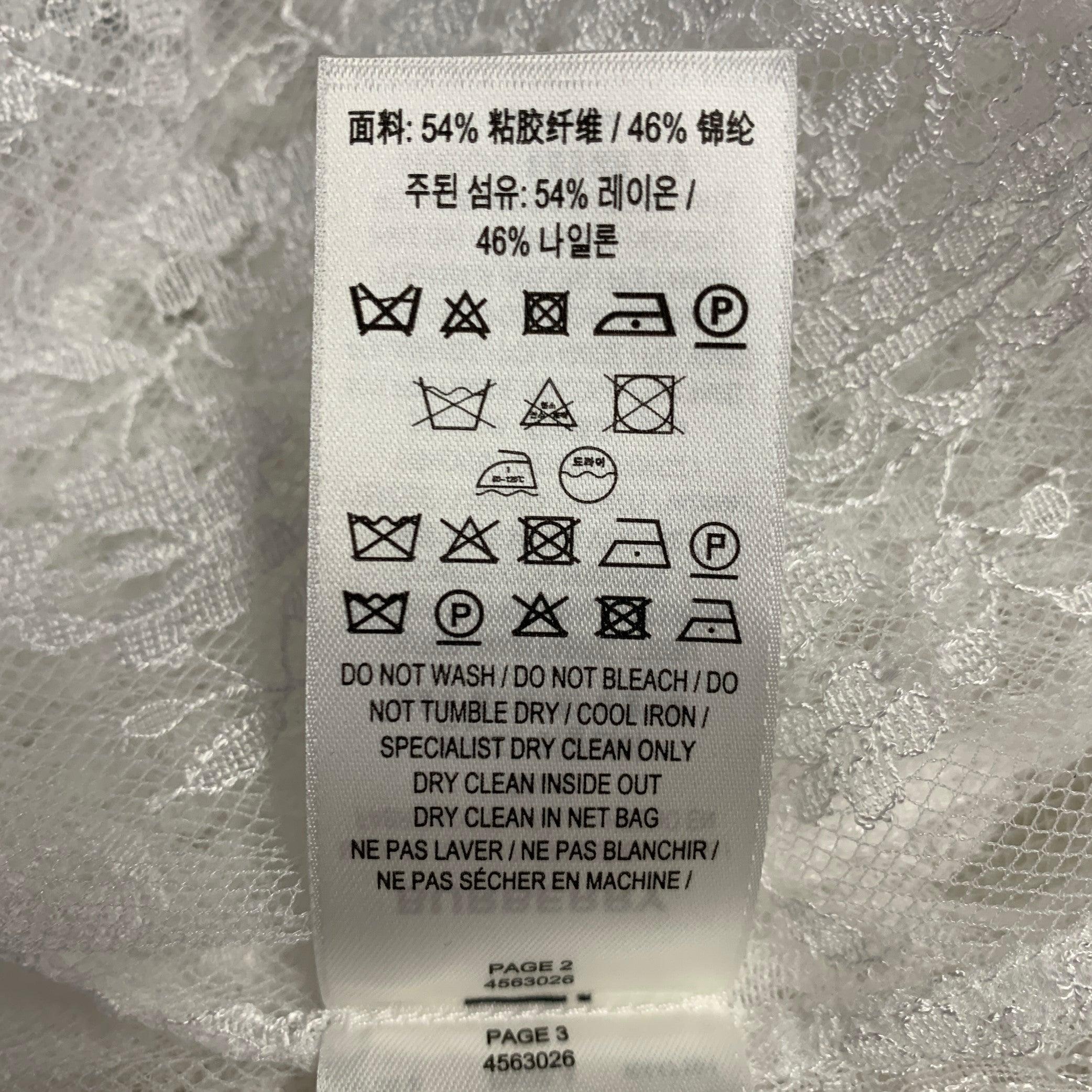 BURBERRY Taille M Chemise à manches longues avec nœud en dentelle blanche et en mélange de viscose en vente 1
