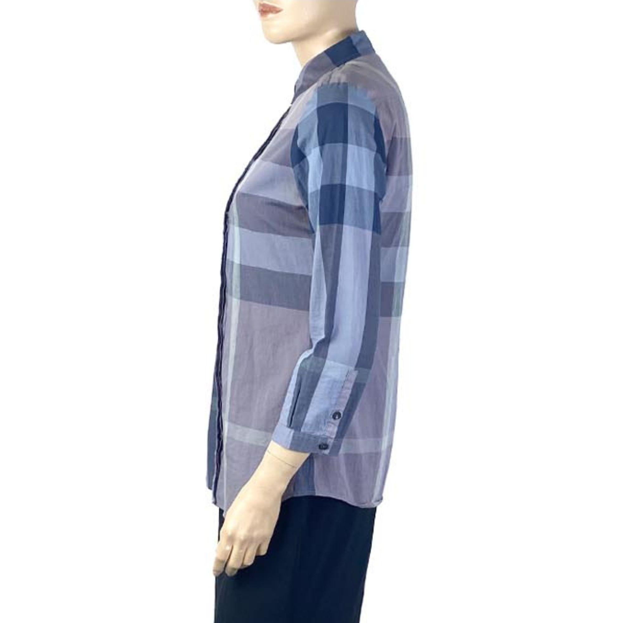 Burberry klassisches blau kariertes Hemd mit Knopfleiste.

Zusätzliche Informationen:
Tag Größe: Small Petite
Brustumfang: 86cm
Taille: 69cm
Hüfte: 94cm
Allgemeiner Zustand: Sehr gut