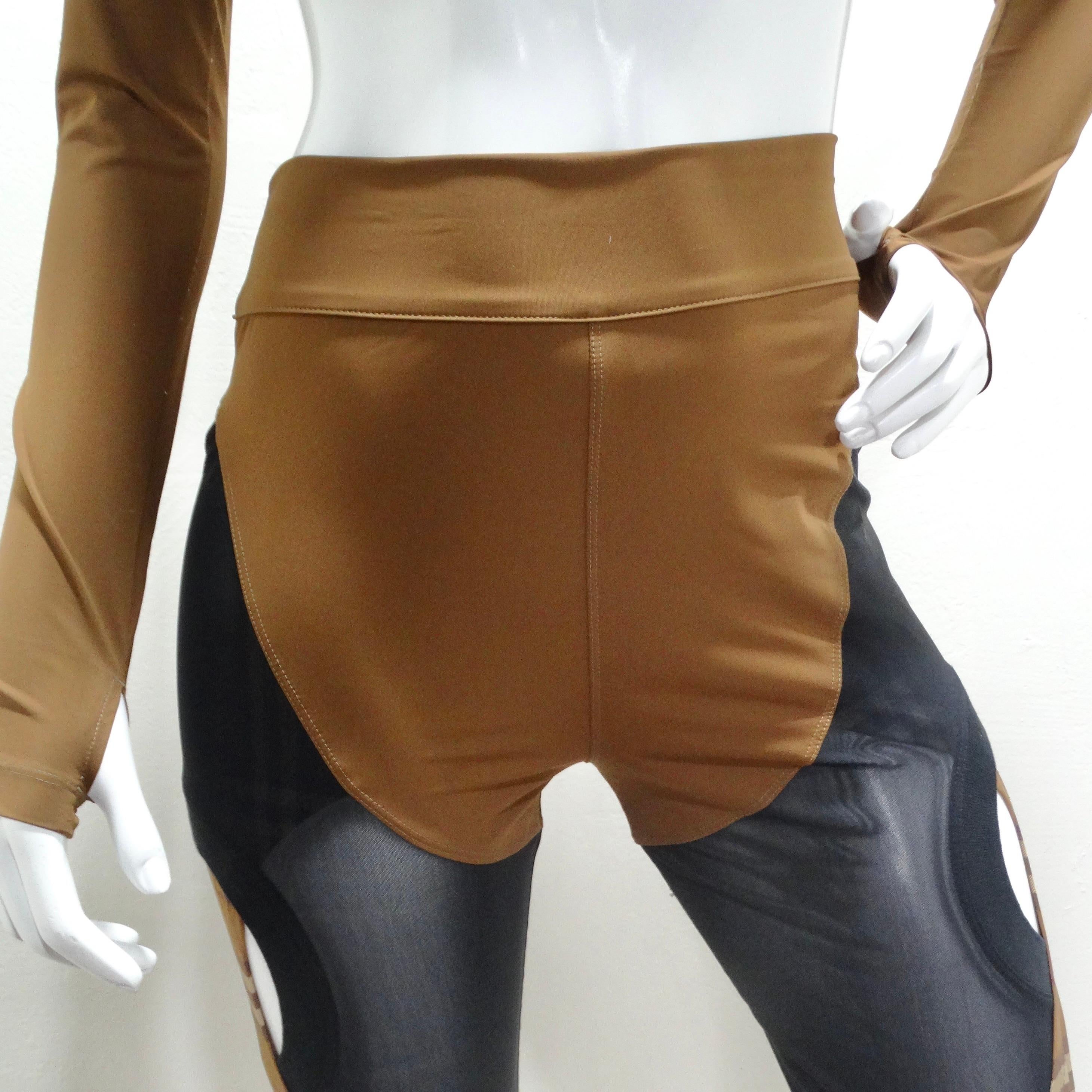 Introducing the Burberry Sporty Panel Brown Leggings – a stunning fusion of style and functionality that will elevate your workout attire to new heights. Crafted in a light brown hue, these leggings feature a unique cut-out design with panels of
