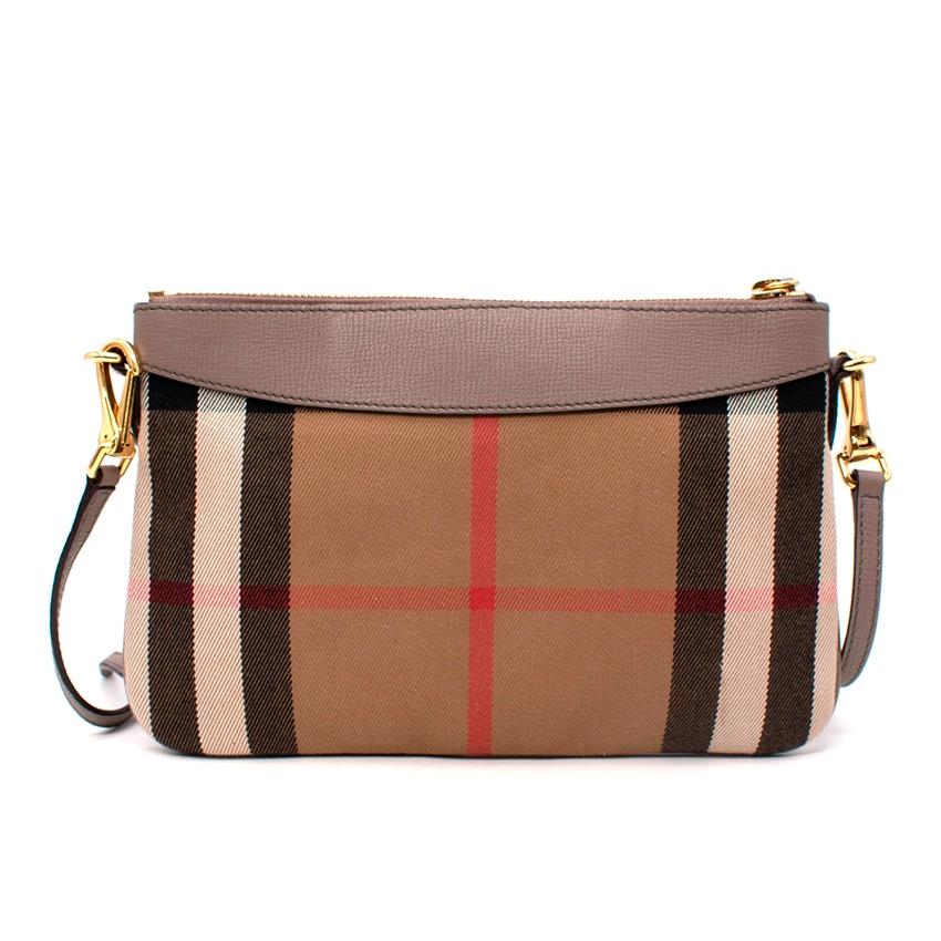 Burberry Taupe Leather & House Check Pouch
 
 
 
 - House check body, complemented by a grained taupe leather flap bearing the house siganture
 
 - Detachable shoulder strap
 
 - Satin lined including slip pocket
 
 - Zip top
 
 
 
 Materials: