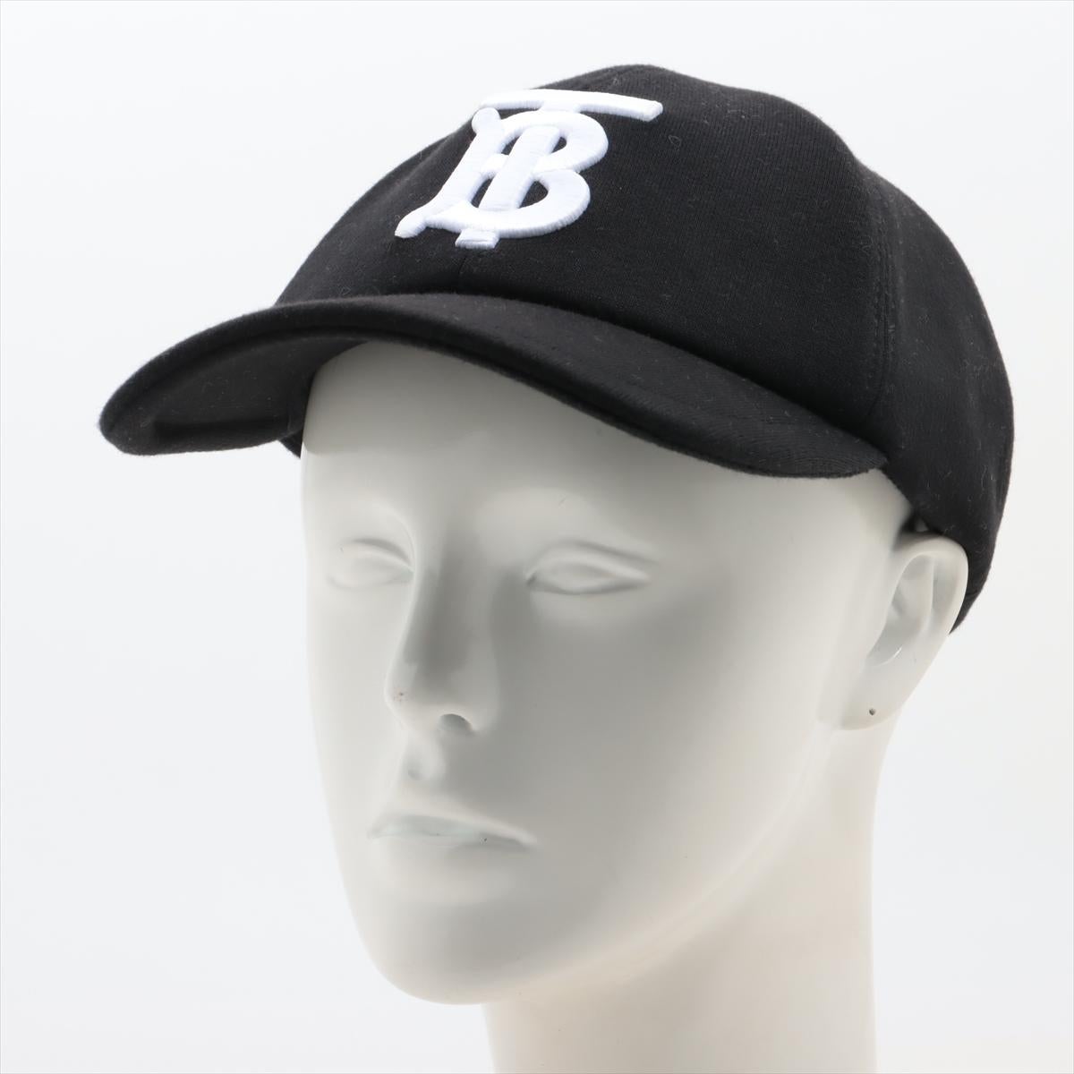 The Burberry TB Logo Cap in black is a sleek and stylish accessory that combines modern fashion with the brand's iconic heritage. Made from quality materials, the cap features signature Thomas Burberry monogram embroidered on the front, adding a