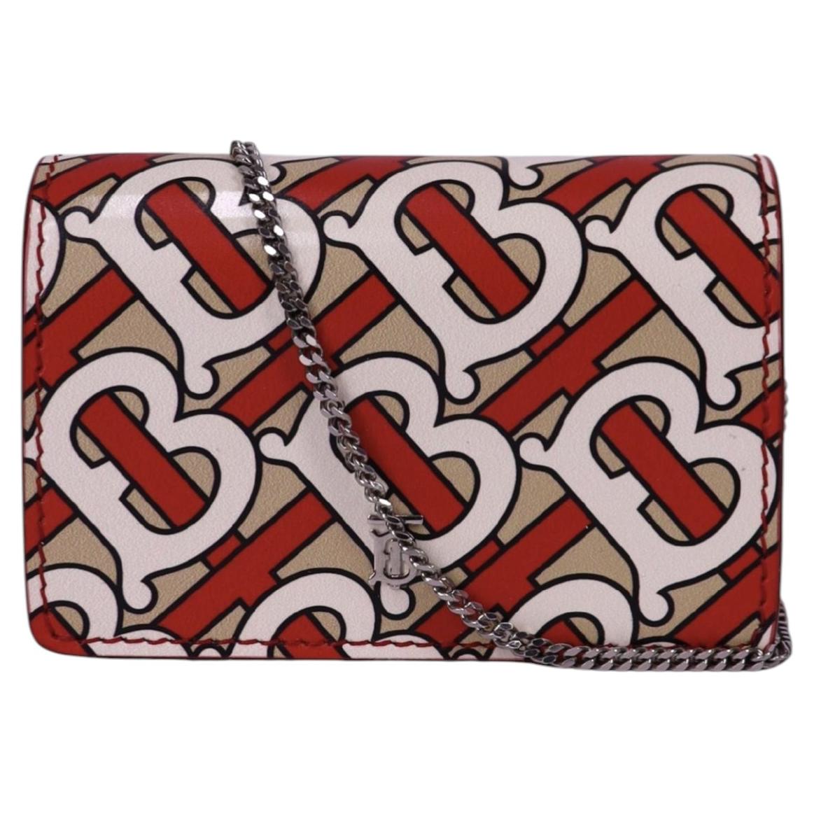 Burberry - Porte-monnaie à chaîne avec monogramme imprimé rouge en vente