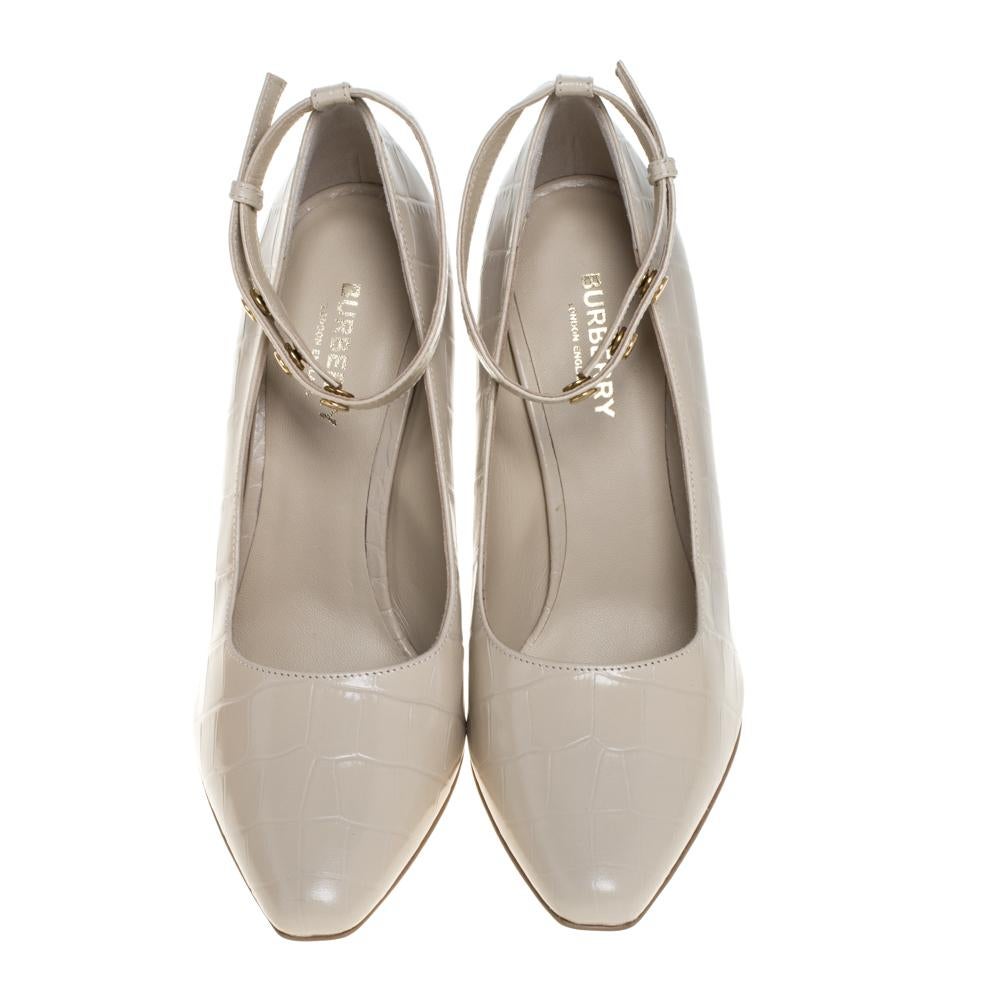 This pair of Burberry pumps are a style statement with a timeless design. Crafted from leather, they feature pointed toes, 11 cm heels, and buttoned ankle straps. They bring a touch of sophistication to every outfit they are paired with.

Includes: