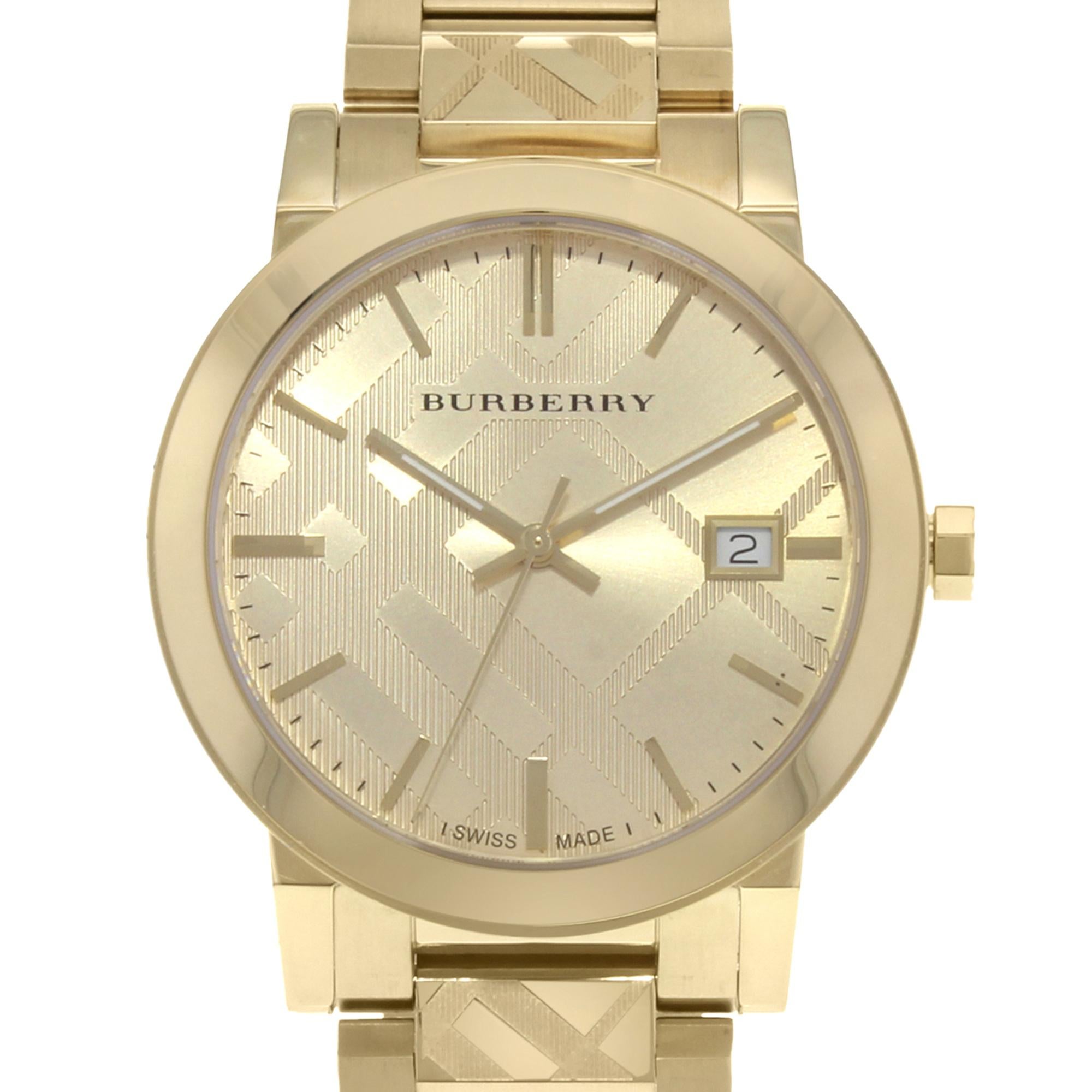Diese gebrauchte Burberry The City BU9038  ist ein schöner Damenzeitmesser, der von einem Quarzwerk (Batterie) angetrieben wird und in einem Edelstahlgehäuse untergebracht ist. Es hat eine runde Form Gesicht, Datum Anzeige Zifferblatt und hat Hand