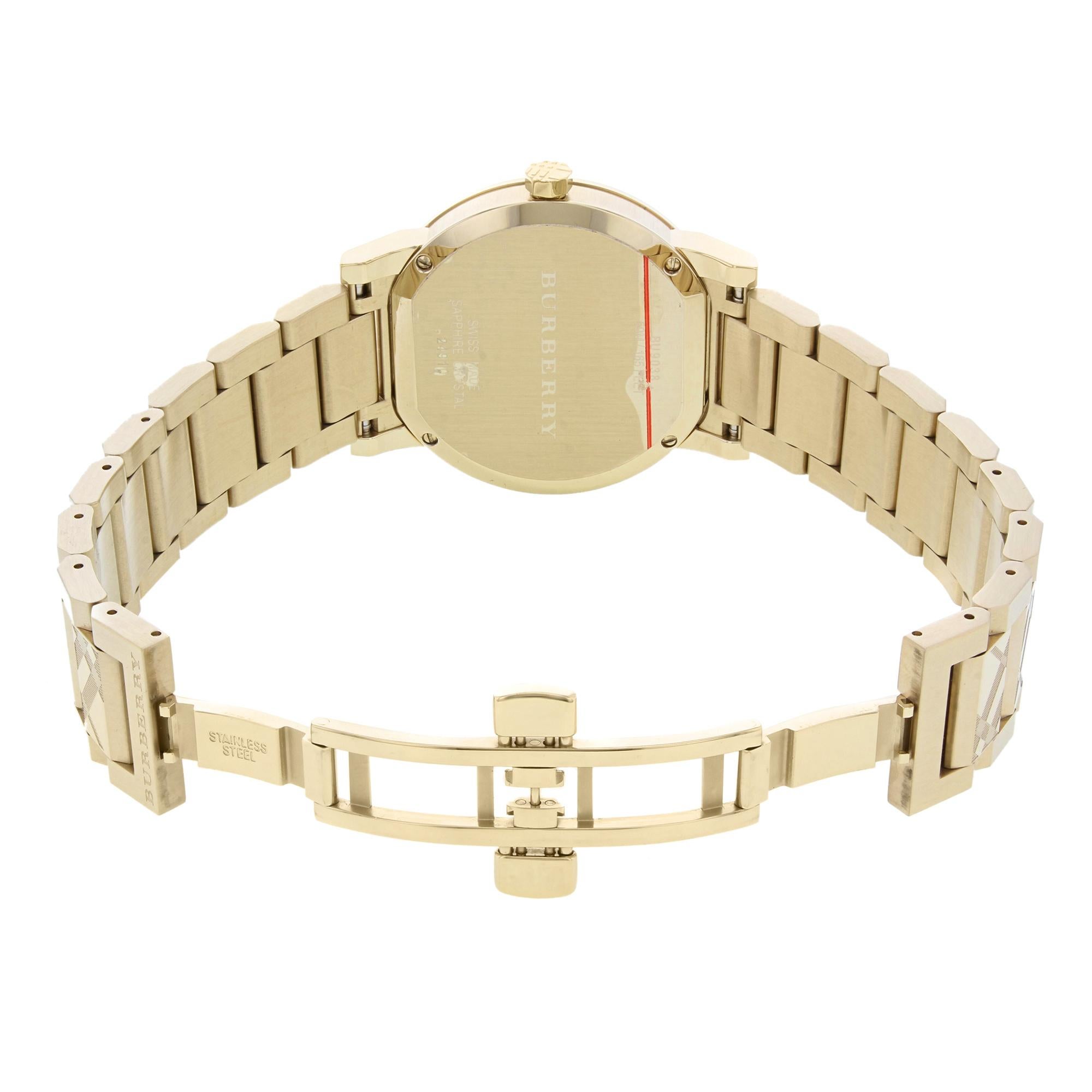 Burberry the City Gold Ion Plated Stahl Gold Zifferblatt Quarz Unisex-Uhr BU9038 im Zustand „Gut“ in New York, NY