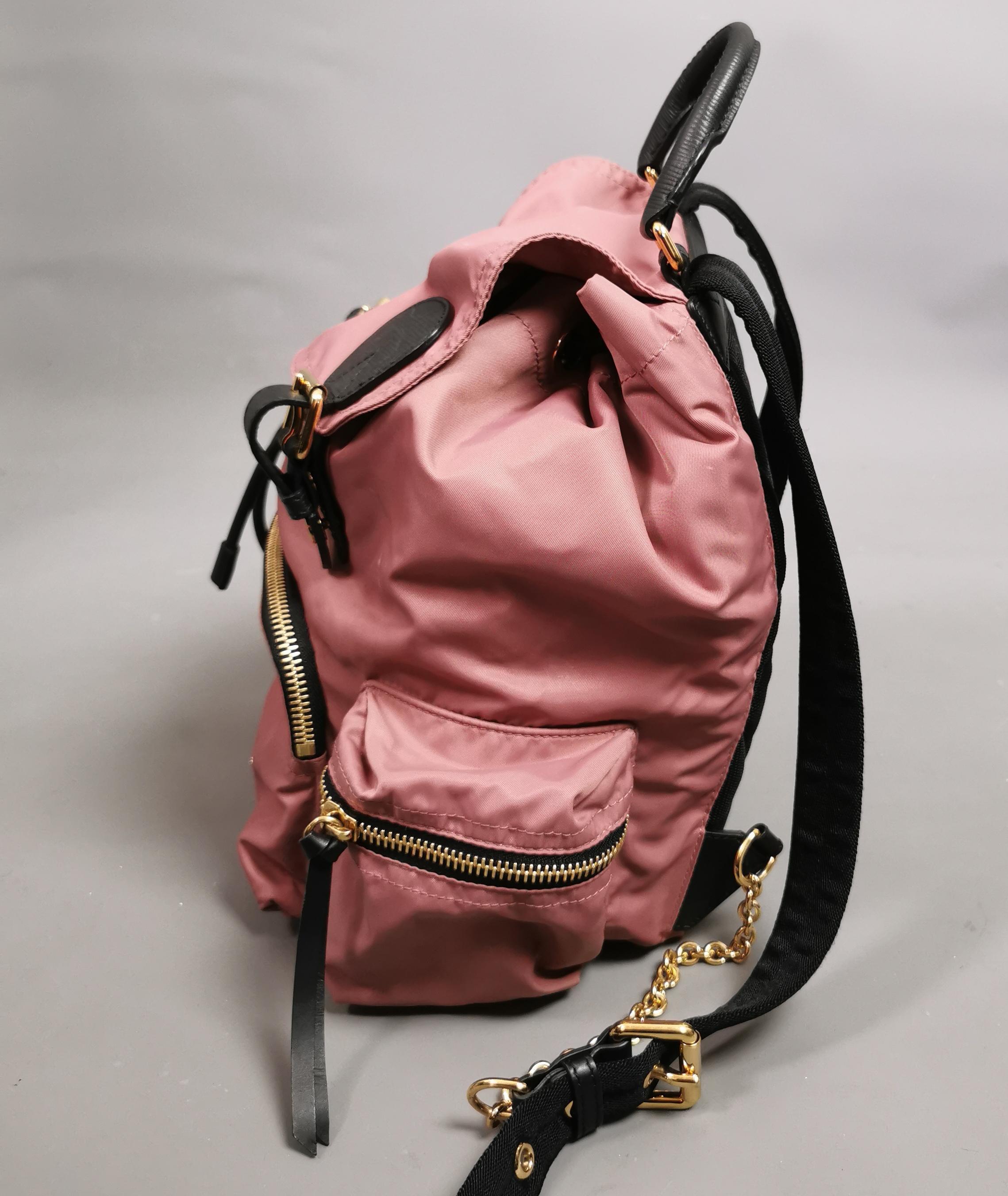 Gray Burberry The Rucksack, pink nylon backpack, gold tone hardware