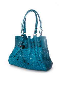 Burberry, turquoise woven leather bag with embossed croc print