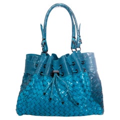 Burberry, turquoise woven leather bag with embossed croc print