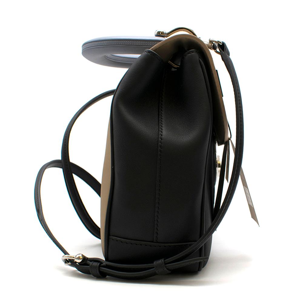 Burberry Black and Beige MD DK88 Top Handle Bag features sculptured round top handle, a foldover top with a push-lock closure, a main internal compartment and an internal zipped pocket

Please note, these items are pre-owned and may show signs of