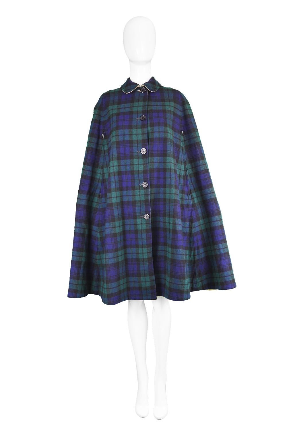 Burberry Vintage 1960s Reversible Trenchcoat Gabardine & Wool Plaid Cloak 

Size: One Size fits most. Please click 'Continue Reading' below to see full measurements and description. 
Bust -Free up to 58” / 147cm
Waist - Free
Hips - Free
Length