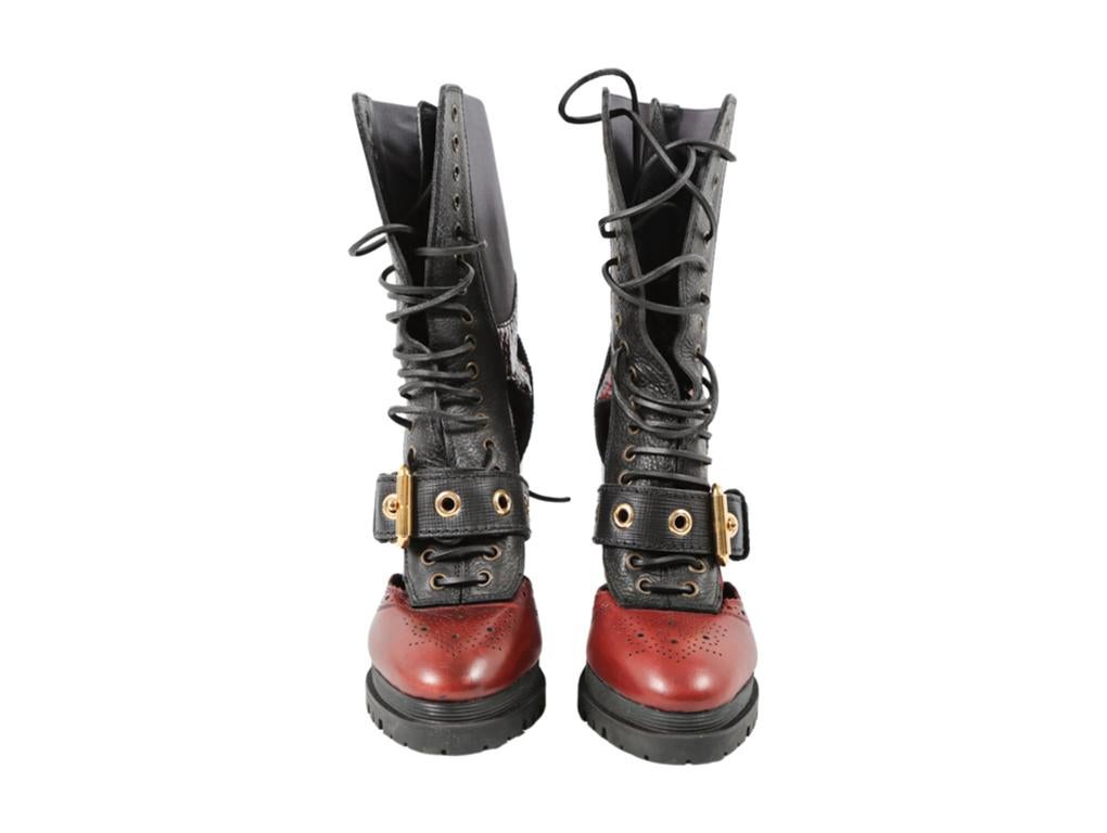 Lovely pair of Burberry Westmarsh Embellished Leather And Snakeskin Cutout Ankle Boots for sale in a size 41, UK8. Purchased, stored and never used. 

This item is pre-owned and has been worn, any signs of wear can be seen in the images or are
