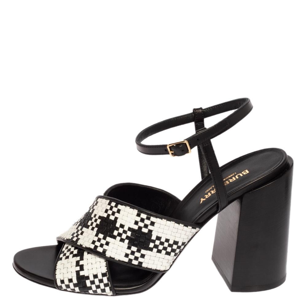 A feminine flair and a timeless appeal characterize these sophisticated Burberry sandals. They offer a minimal design, woven leather straps, and sturdy block heels. These sandals can be easily styled with a host of outfits.

Includes: Original