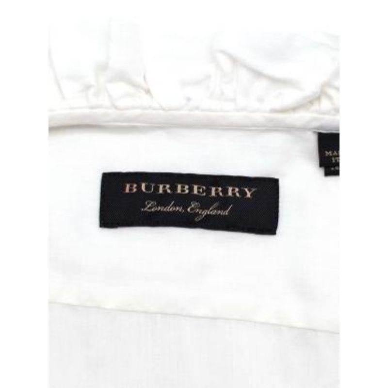 Burberry White Cotton Voile Blouse
 

 - Made of luxurious cotton. 
 - Perfect fitting blouse. 
 - Button up blouse.
 - Long sleeves.
 - Frilled collar. 
 

 Made in Italy.
 Machine wash at 30 degrees. 
 Condition 9.5/10.
 

 PLEASE NOTE, THESE