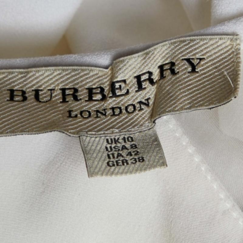 Burberry - Top a maniche corte in crepe bianco M. In condizioni discrete in vendita a Dubai, Al Qouz 2