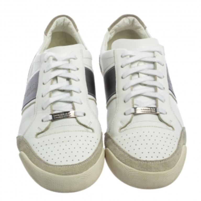 Enjoy footwear ease with this pair of sneakers by Burberry. They've been crafted from suede and leather and designed with perforated round toes, lace-up on the vamps, and brand details on the sides. The leather insoles and rubber outsoles add to the