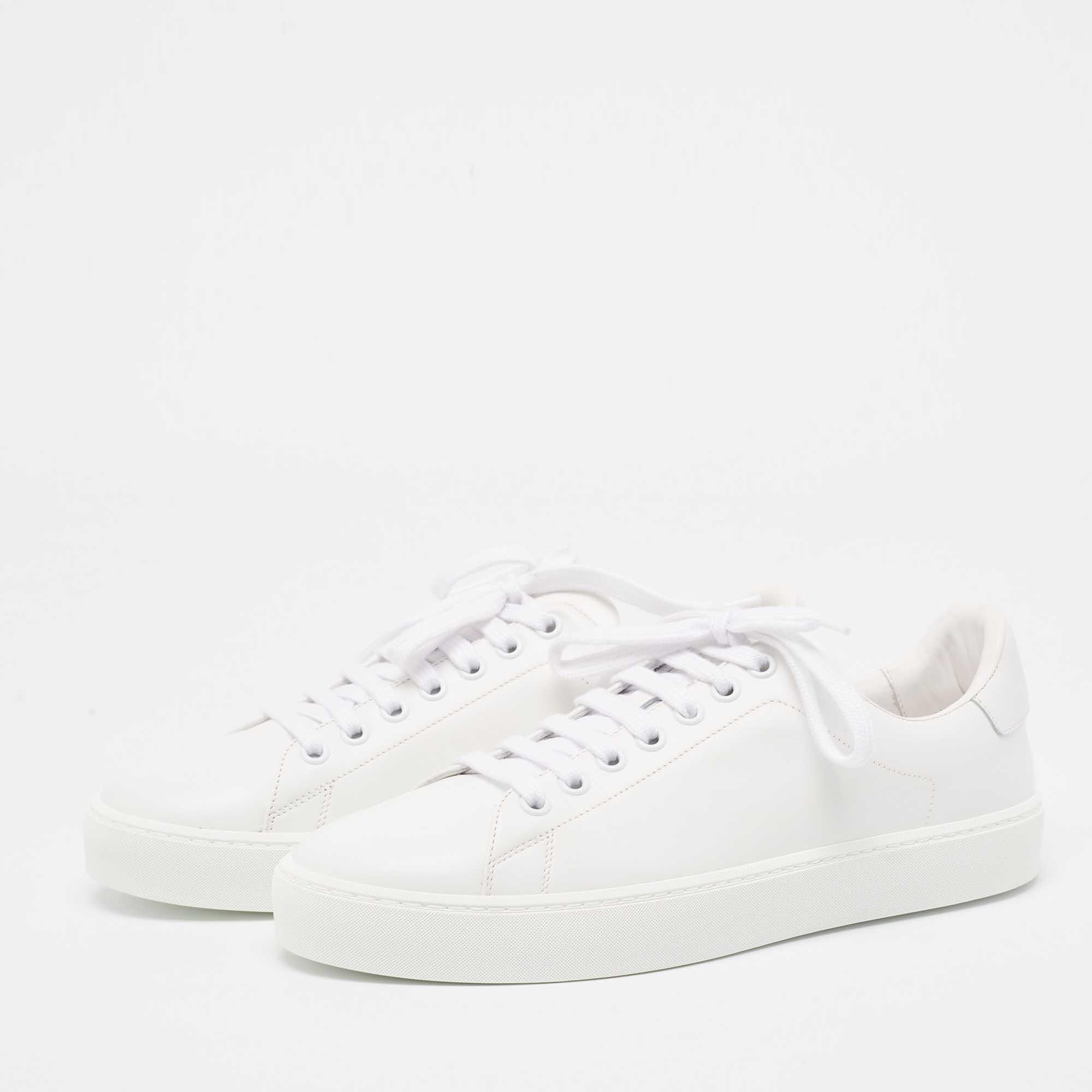 Coming in a classic silhouette, these designer sneakers are a seamless combination of luxury, comfort, and style. These sneakers are finished with signature details and comfortable insoles.