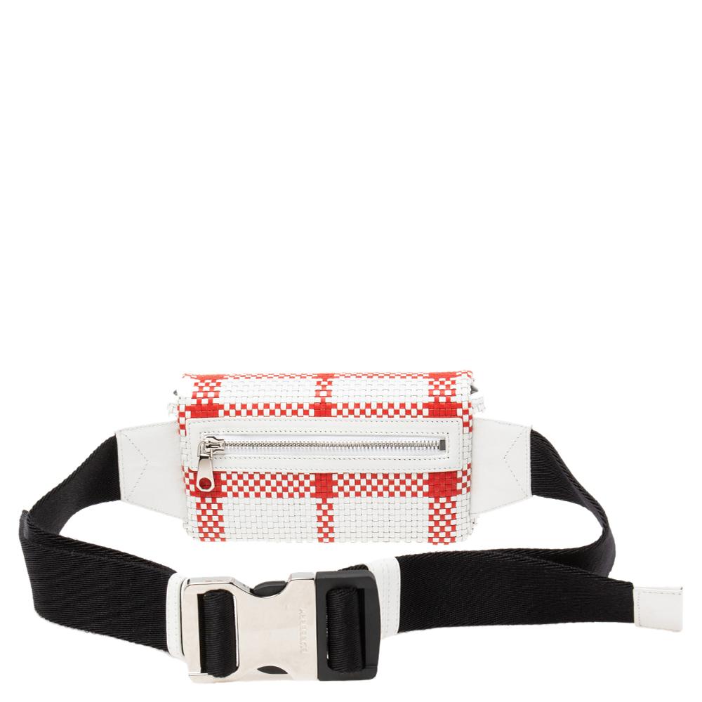 This Lola belt bag from Burberry does complete justice to the brand's timeless aesthetic. Externally, it is made using red and white woven leather with a TB accent decorating the front. It features a strap that is adjustable.

Includes: Original