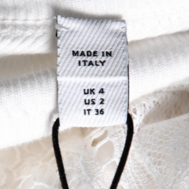 Aesthetically pleasant and pretty, this slip dress from Burberry will become your favorite creation in no time! It is designed using white satin and is enriched with lovely lace panels. It has a feminine, ethereal design and a sleeveless style. It