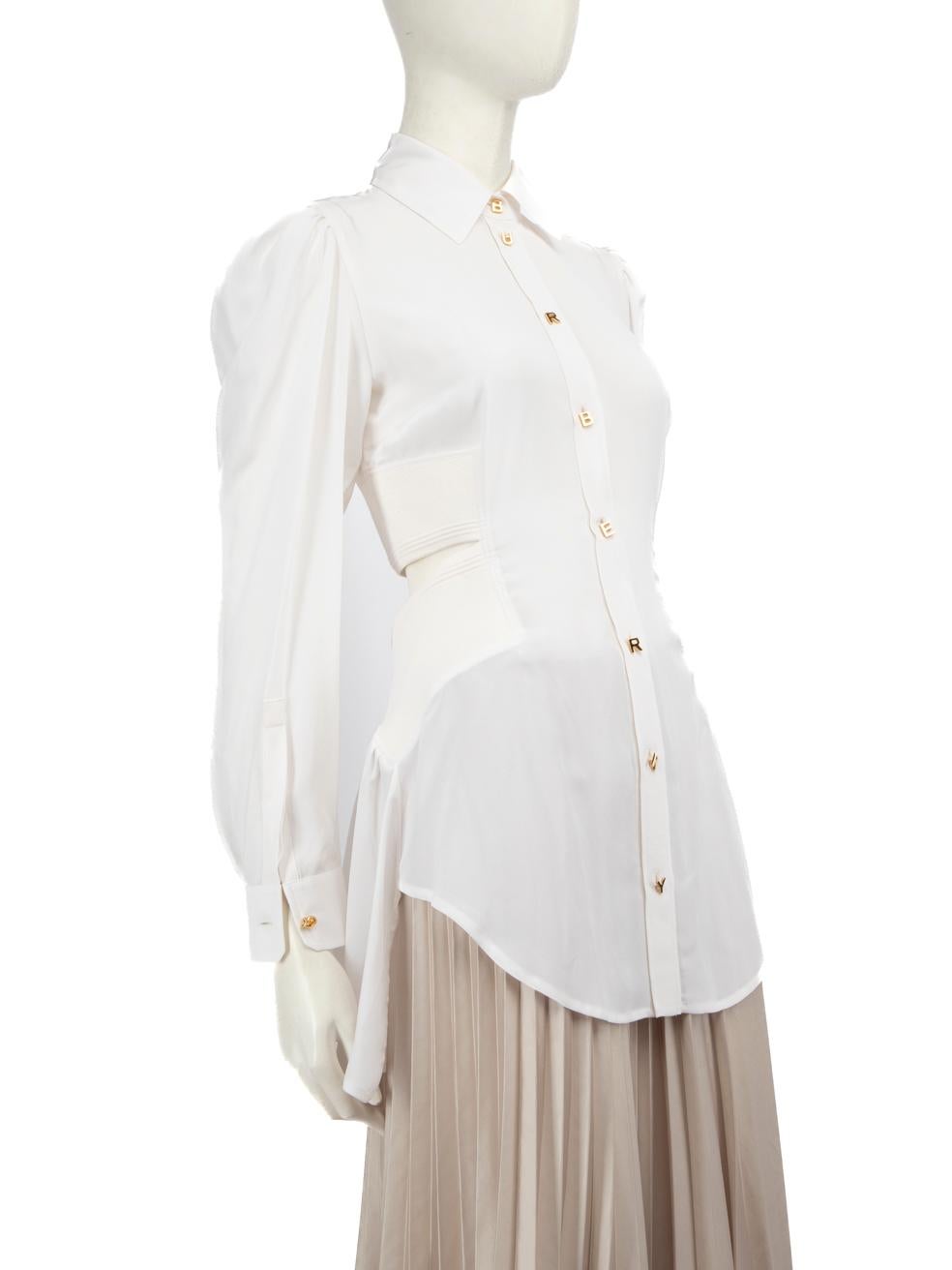 CONDITION is Never worn, with tags. There is a very light black mark on the right shoulder on this new Burberry designer resale item.
 Details
 White
 Silk
 Shirt
 Long sleeves
 Stretchy
 Cut out detail
 Logo button detail
 Round neck
 Front button