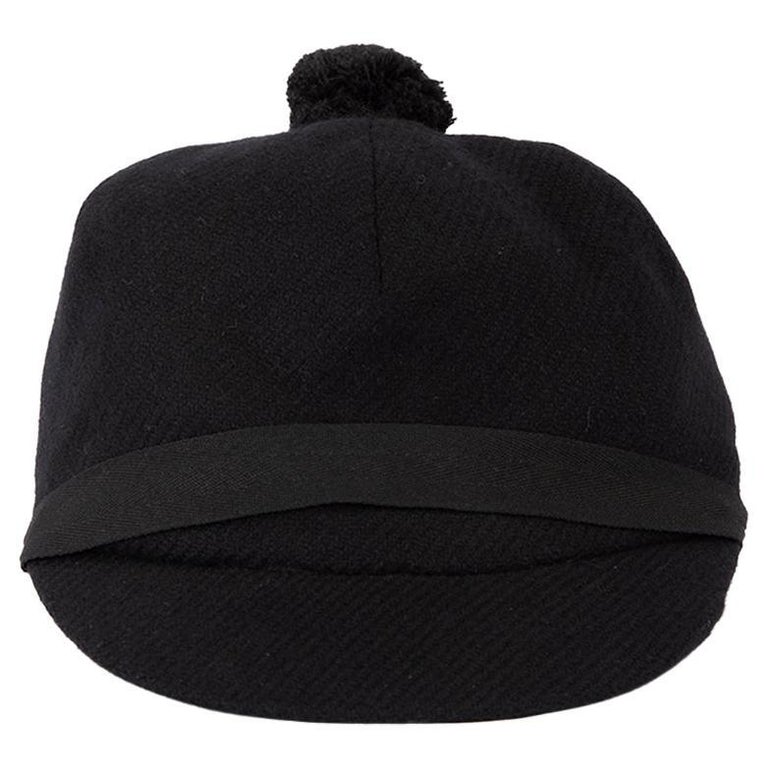 Burberry Women's Black Pom Pom Accent Newsboy Hat For Sale at 1stDibs