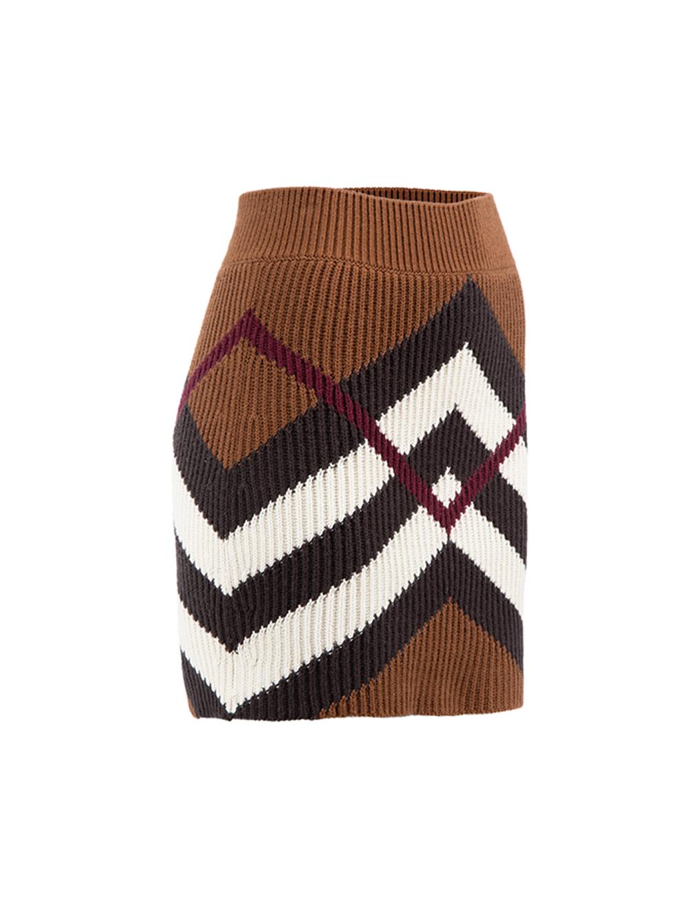 CONDITION is Never Worn. No visible wear to skirt is evident on this used Burberry designer resale item.



Details


Brown with white and burgundy

Cashmere, cotton

Figure-hugging

Mini skirt

Chevron pattern

Knit

Slip on





Made in