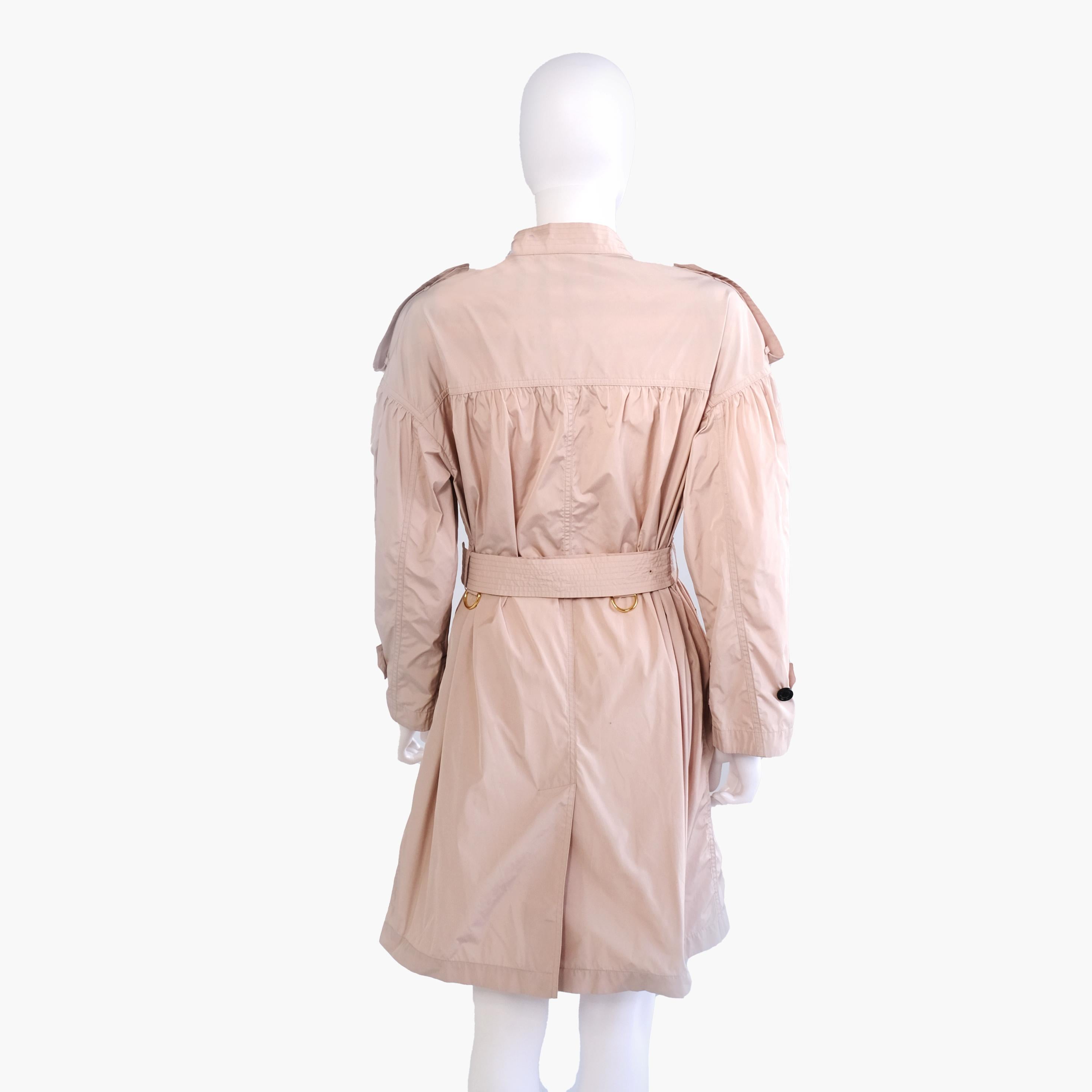 Burberry Pink Raincoat - Women's Size 6 US 
This Burberry lightweight raincoat is stylish and functional, perfect for rainy or transitional weather. It is designed with signature Burberry craftsmanship and a belted waist for a flattering silhouette