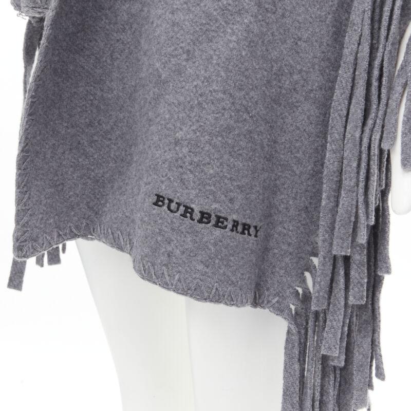 BURBERRY wool cashmere grey solid felted fringe knitted overstitching scarf
Reference: MELK/A00116
Brand: Burberry
Designer: Christopher Bailey
Material: Wool, Cashmere
Color: Grey
Pattern: Solid
Made in: Italy

CONDITION:
Condition: Unworn in mint