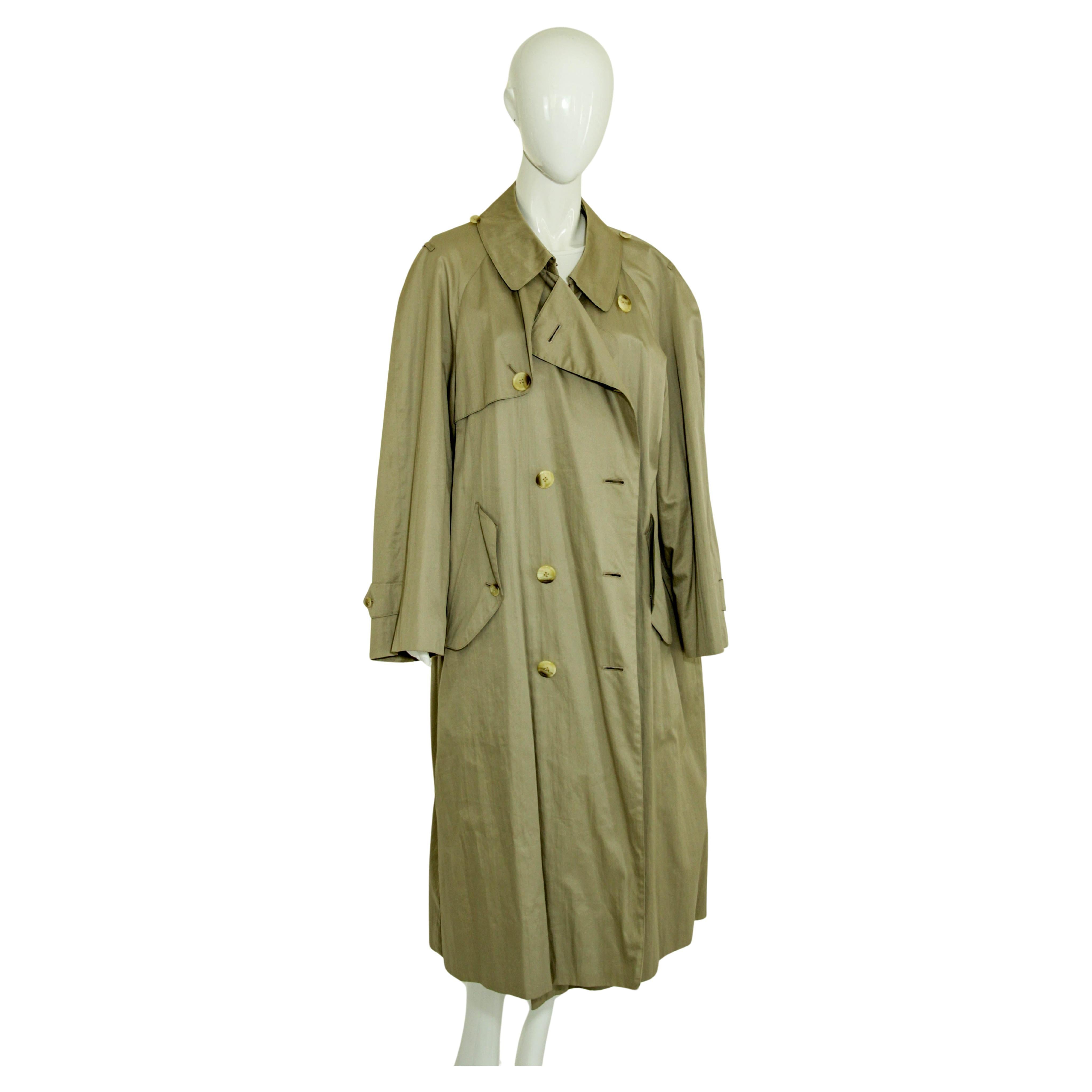 Burberry Classic Double Breasted Trench.
Burberry's trench coat, vintage coat, classic, tan gabardine trench dating to the 1980's. 
An excellent vintage trench coat Mackintosh by Burberry from circa 1980s when, prior to dropping the 's' in 1998,
