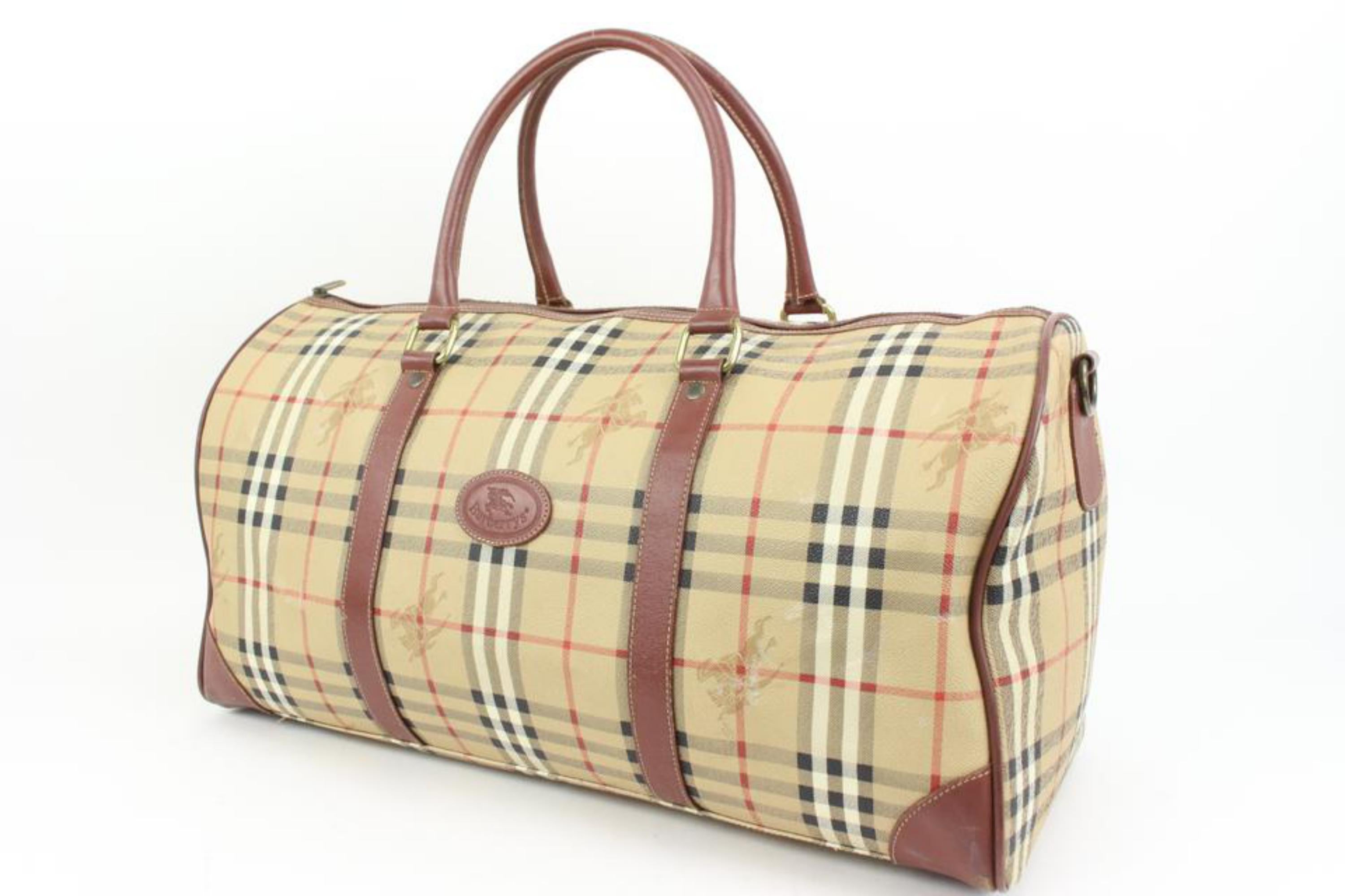 Burberrys Nova Check Boston Duffle Travel Boston Bag 44b97
Made In: Italy
Measurements: Length:  20