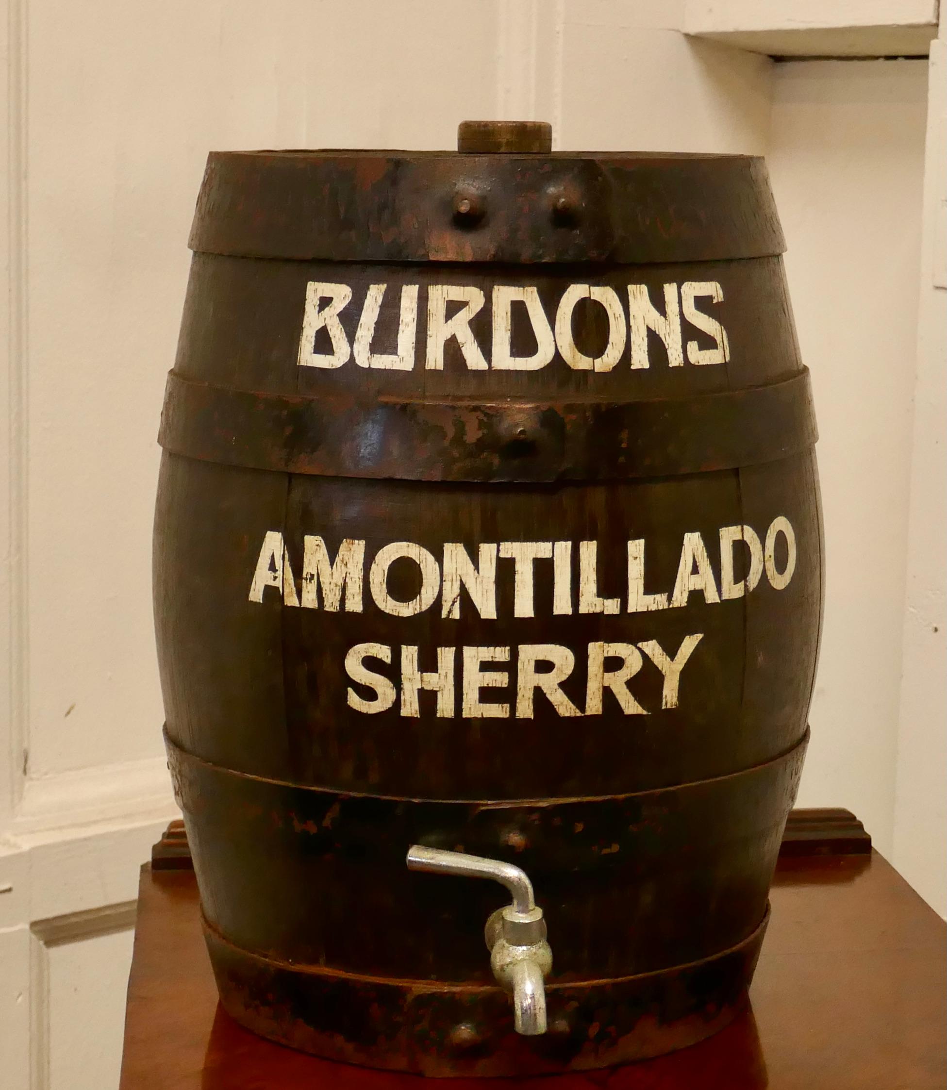 Burdons Bar Top Oak Amontillado Sherry Barrel 

A good looking piece, made in oak and iron bound, this barrel would have sat on the bar top to dispense Fine Amontillado Sherry, it has the original chrome tap and is in good condition
The barrel is