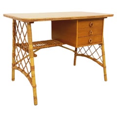 Bureau vintage de Louis Sognot en rotin et bois des années 60