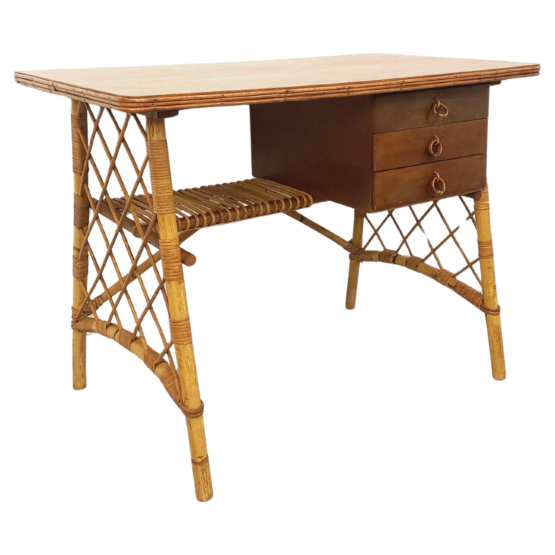 Bureau vintage de Louis Sognot en rotin et bois des années 60