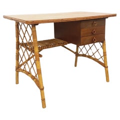 Bureau vintage de Louis Sognot en rotin et bois des années 60