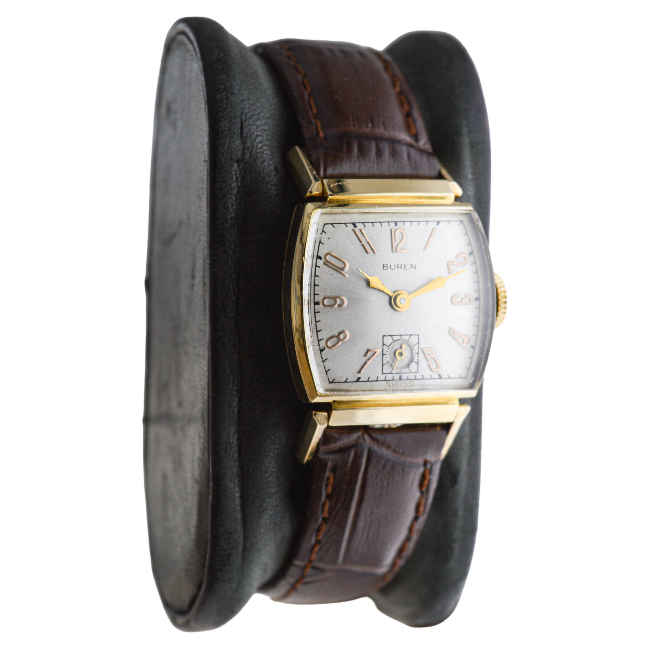 FACTORY / HOUSE: Buren Watch Company
STYLE / REFERENCE: Art Deco
METAL / MATERIAL: 14Kt Gold Filled
CIRCA / YEAR: 1940's
DIMENSIONS / SIZE: 42mm Length X 23mm Diameter
MOVEMENT / CALIBER: Manual Winding / 17 Jewels / Caliber 
DIAL / HANDS: Silvered