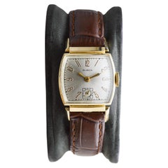 Orologio Buren in oro Art Deco con anse articolate degli anni '40