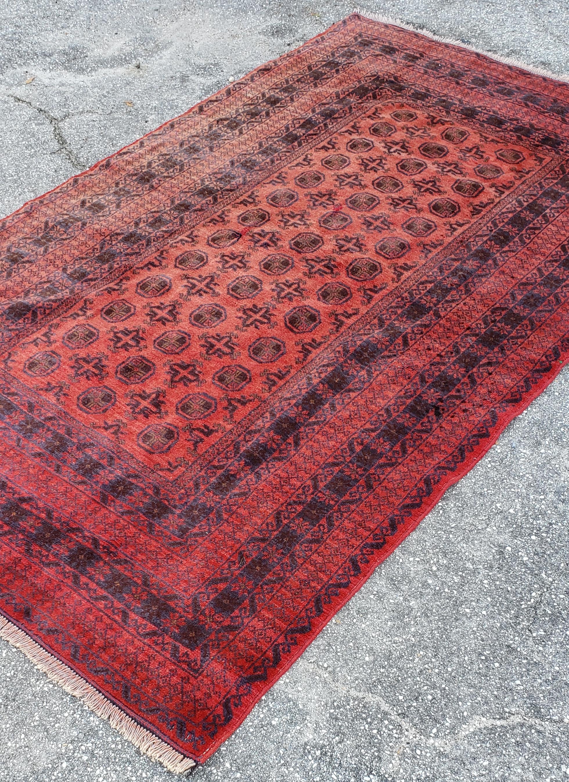 We carry some of the best Afghan rugs around, and if you like to give your room a colorful new look with one of our stunning carpets, we are here to help. This one measures approximately 80
