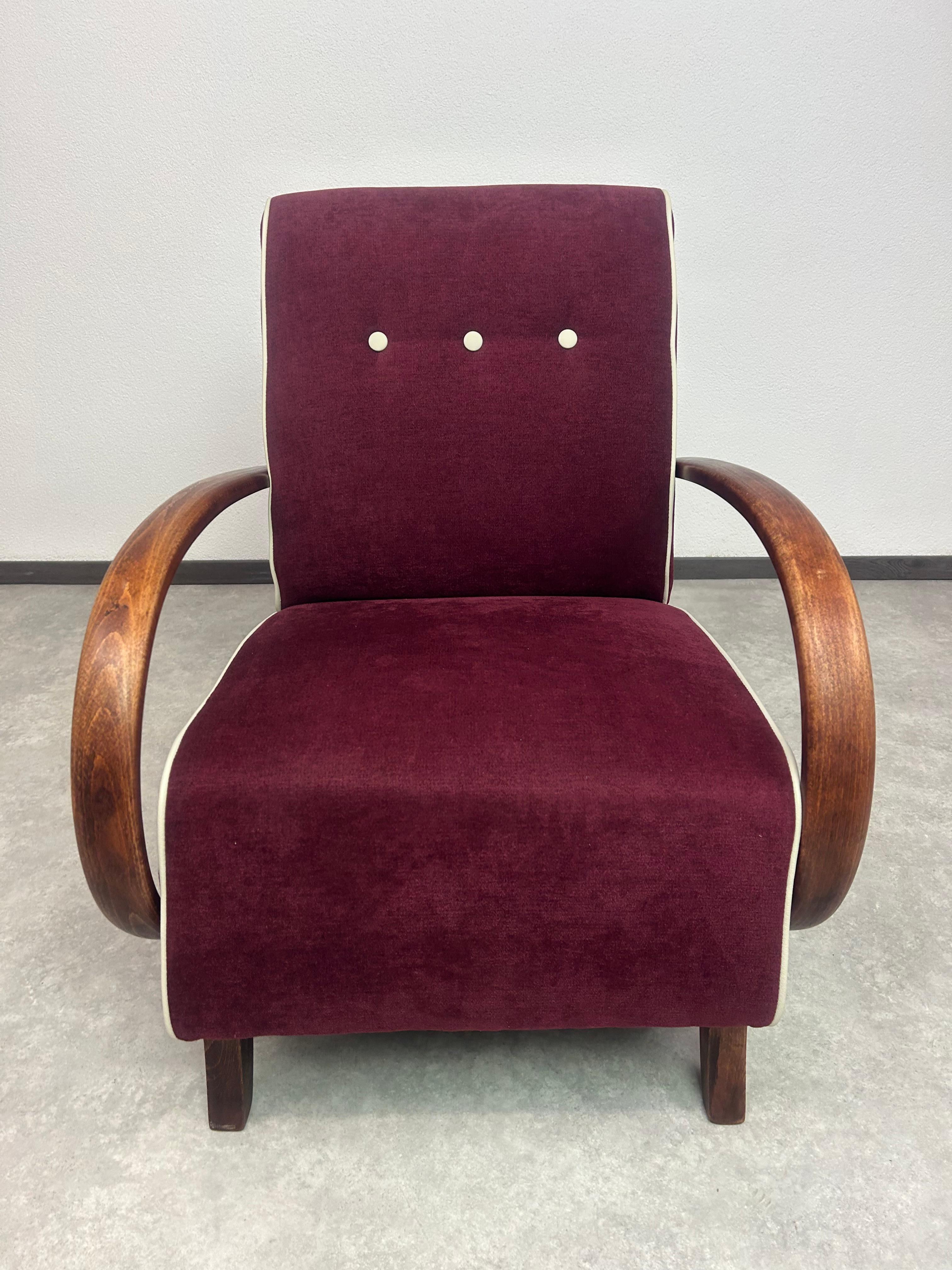 Burgundy armchair H227 by Jindřich Halabala. Professionally stained and repolished.

