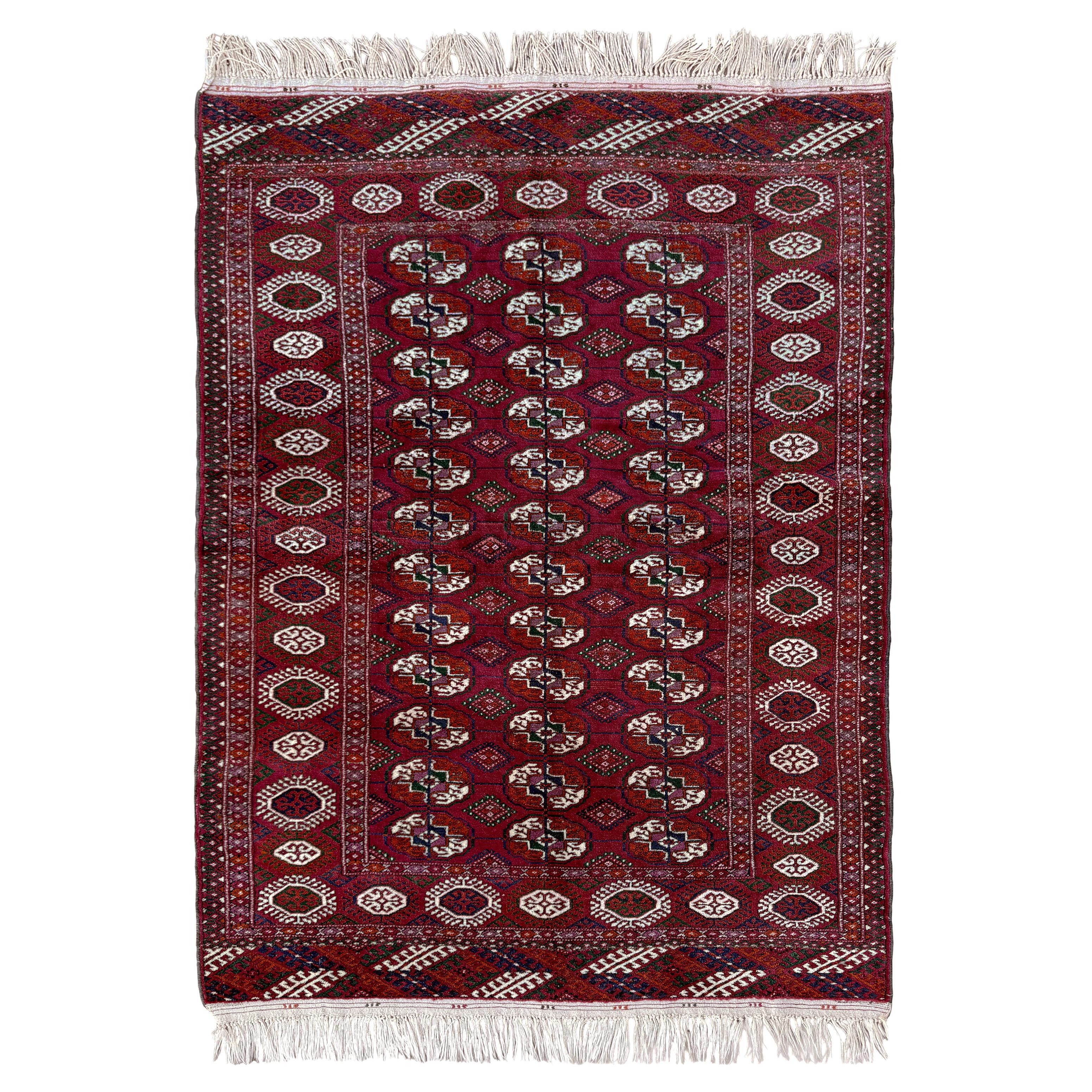Burgundy Bukhara Rug • Handmade Vintage Turkmen Wool Rug (4×6) • 1960s For Sale