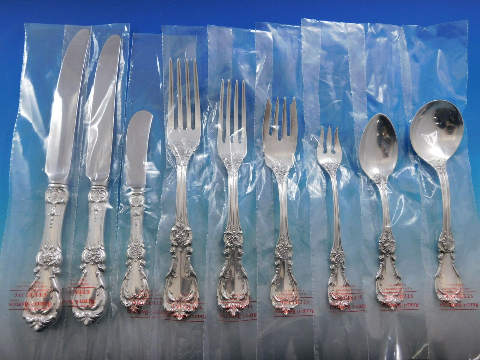 Inspired by the French Renaissance, the Burgundy Sterling Silver flatware pattern from Reed & Barton is decorated with motifs of scrolls, leaves and flowers which captures old world elegance with up-to-date flourishes. 

Unused Burgundy by Reed