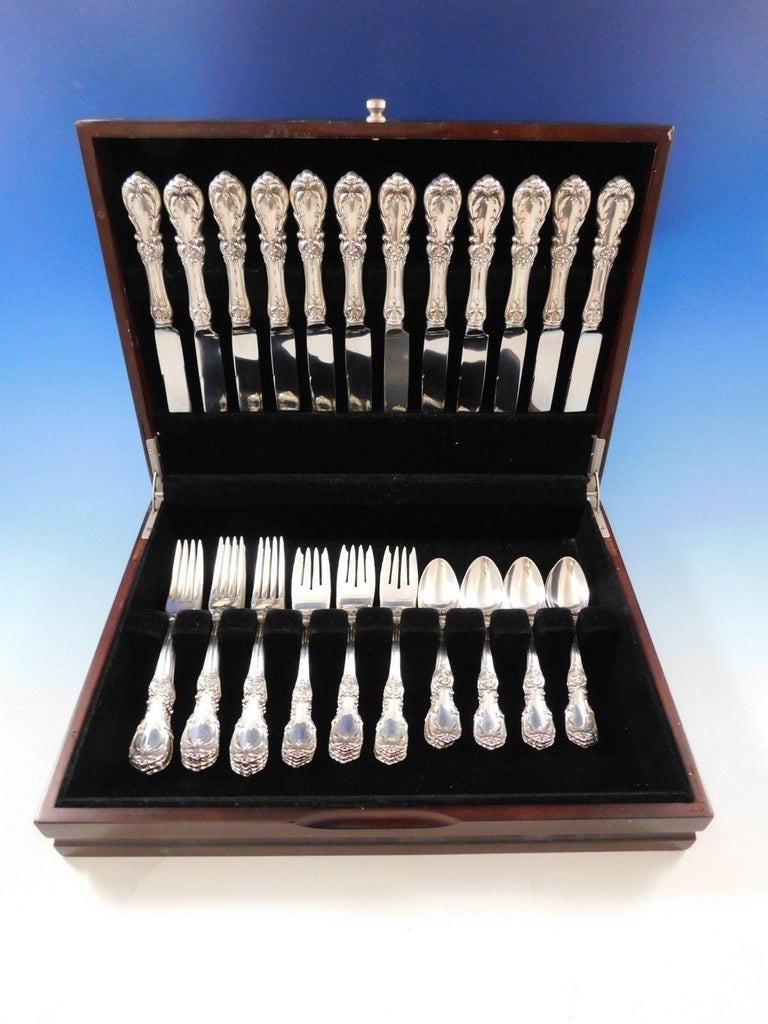 Beautiful burgundy by Reed & Barton silver flatware set, 48 pieces. This set includes:

12 knives, 9 1/4