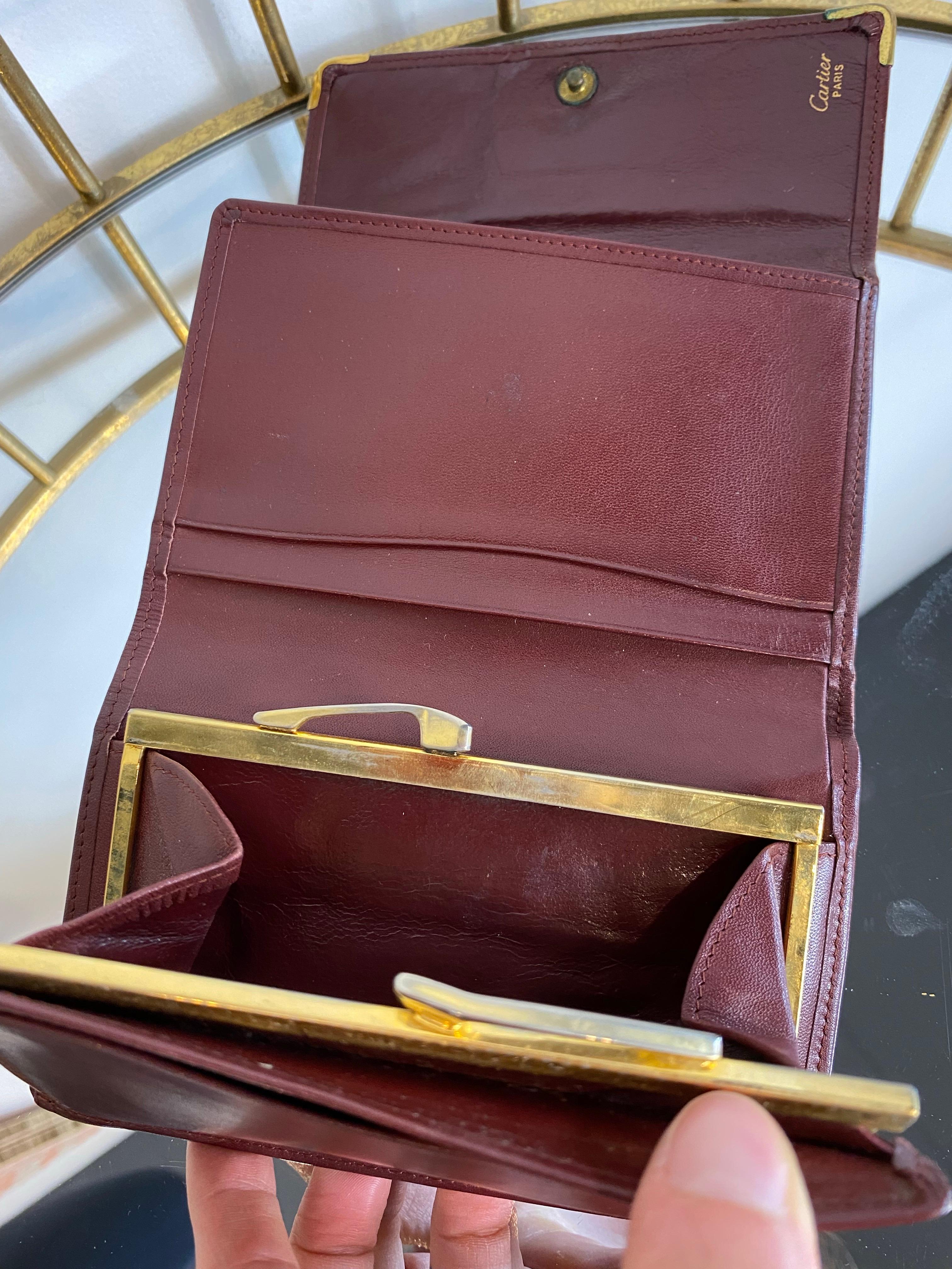 Burgundy Cartier wallet. For Sale 1