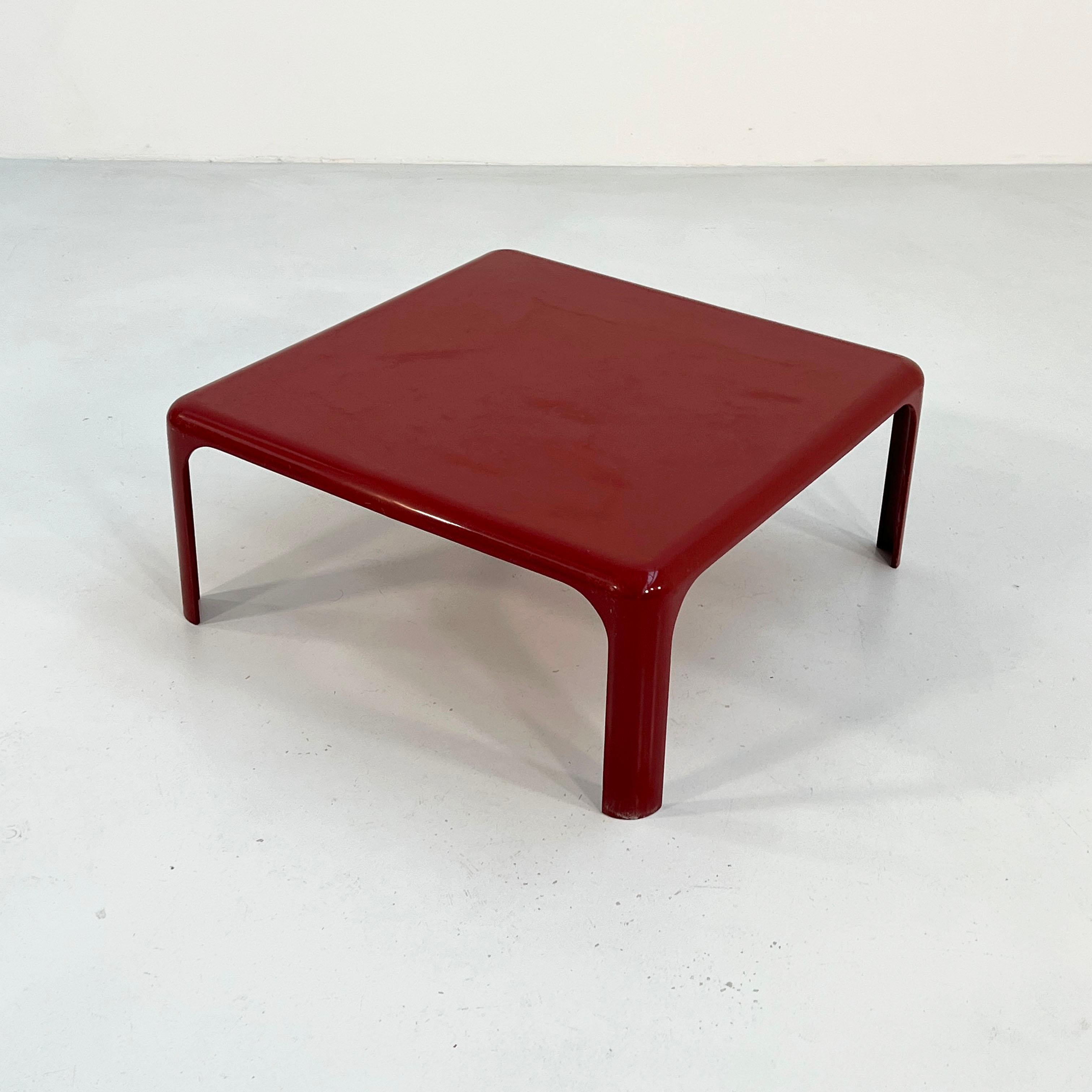 Designer - Vico Magistretti
Producer - Artemide
Model - Demetrio 70 Coffee Table 
Design Period - Sixties 
Measurements - Width 70 cm x Depth 70 cm x Height 30 cm
Materials - Plastic
Color - Burgundy
Light wear consistent with age and use. One small