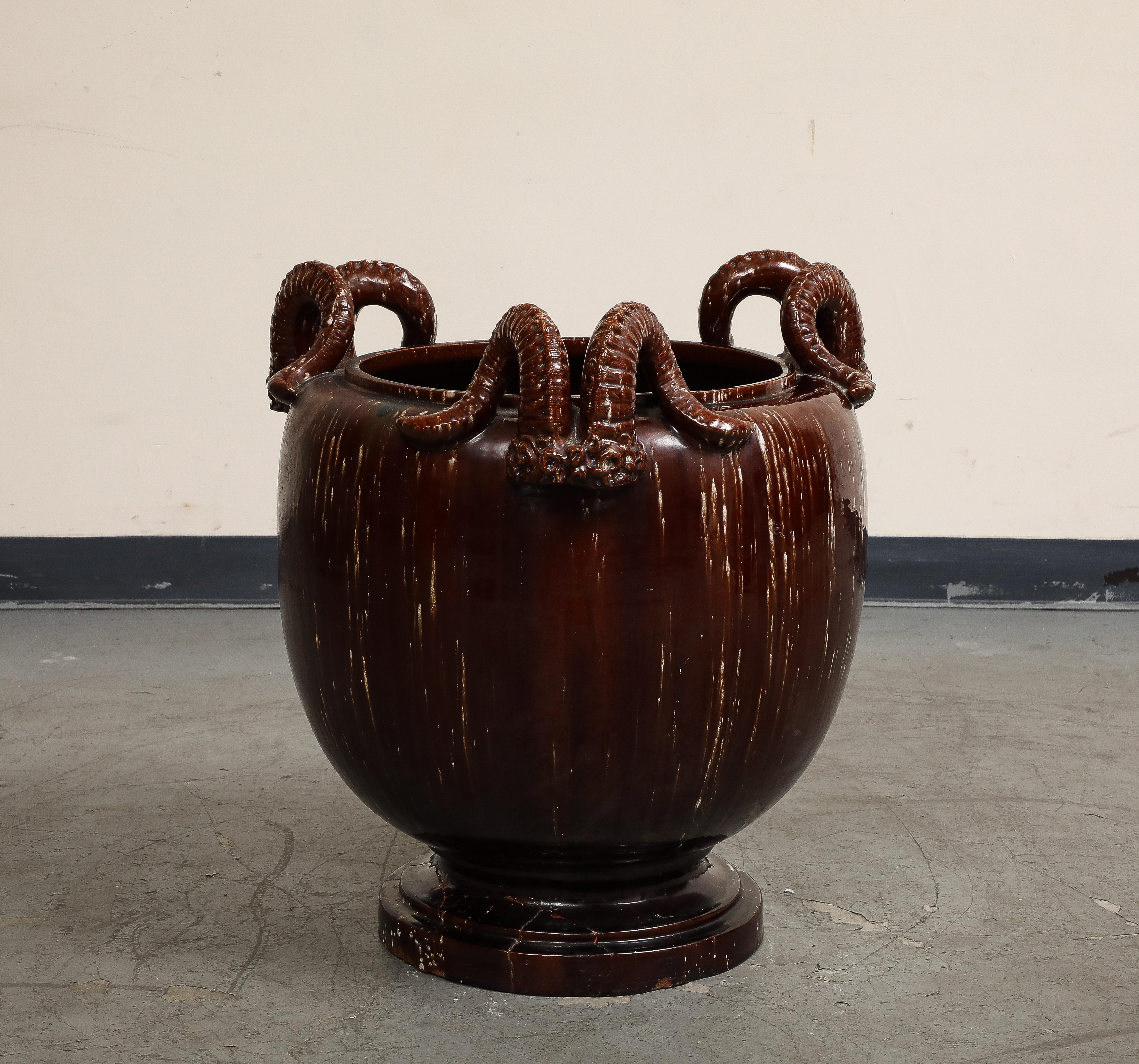 Chinese Export Burgundy Glazed Chinese Pottery Jardiniere with Ram's Horns For Sale