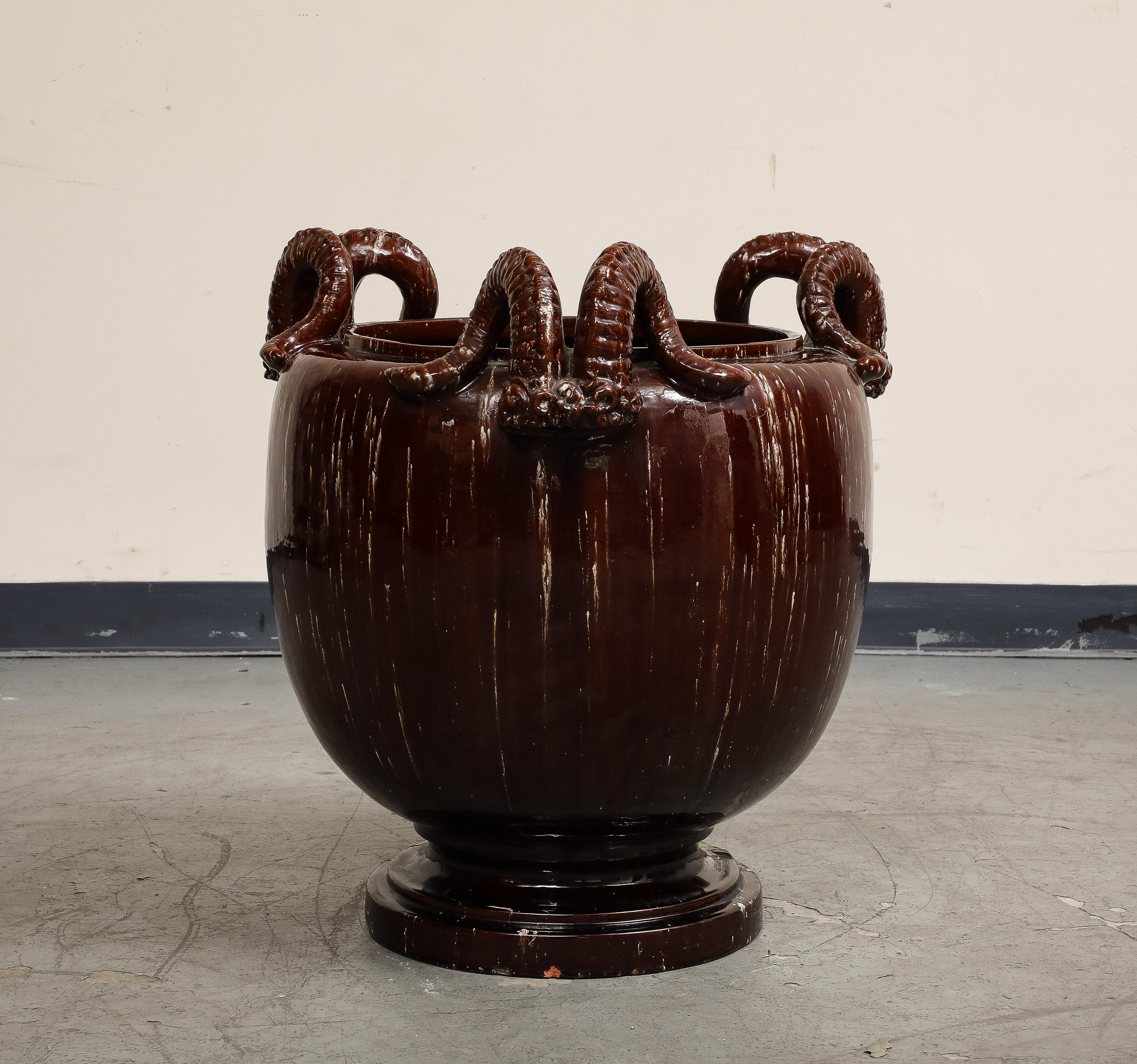 Burgundy Glazed Chinese Pottery Jardiniere with Ram's Horns In Fair Condition For Sale In Chicago, IL