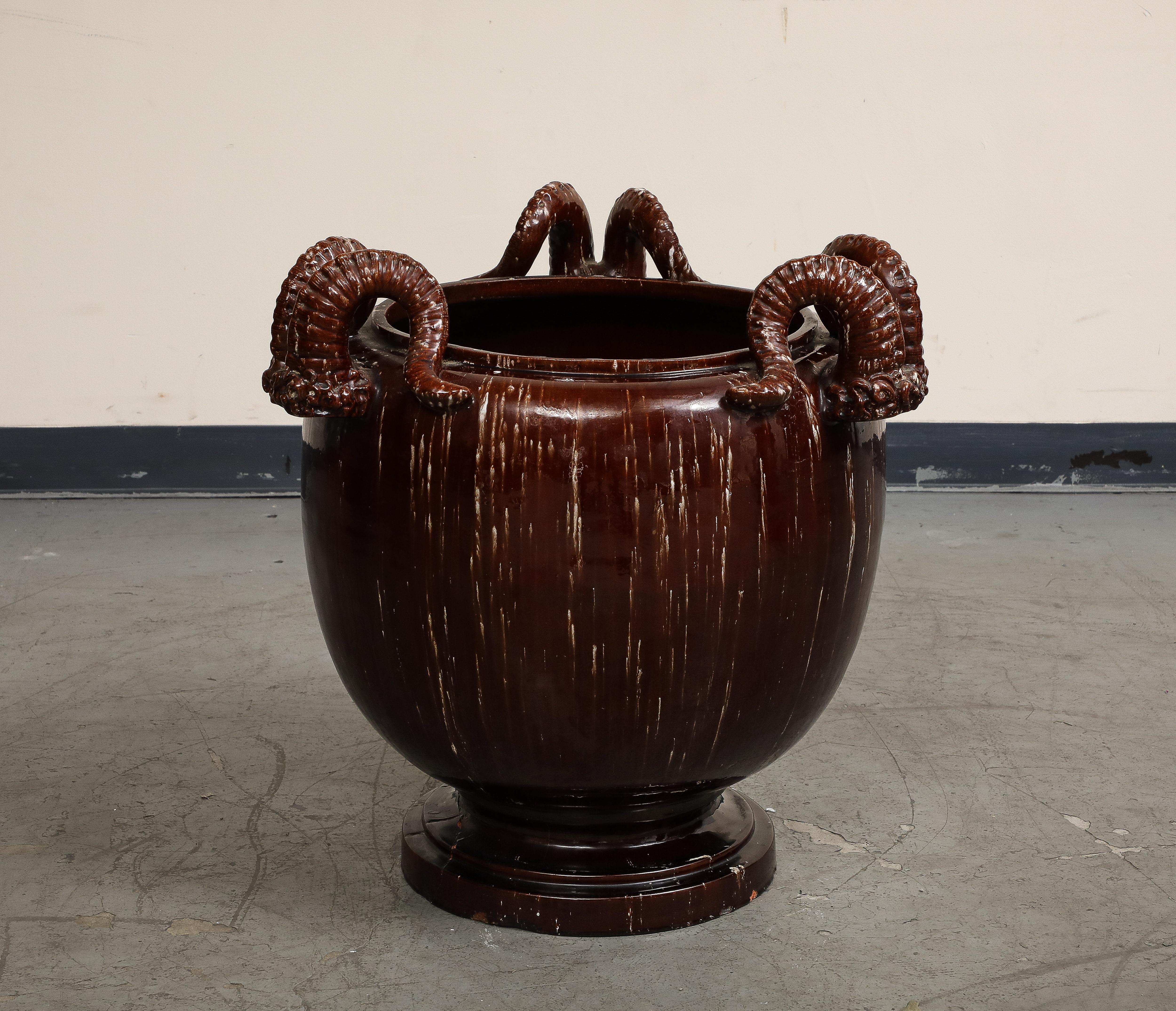 20th Century Burgundy Glazed Chinese Pottery Jardiniere with Ram's Horns For Sale