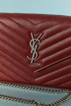 Burgundy grained leather bag with chain shoulder strap Yves Saint Laurent