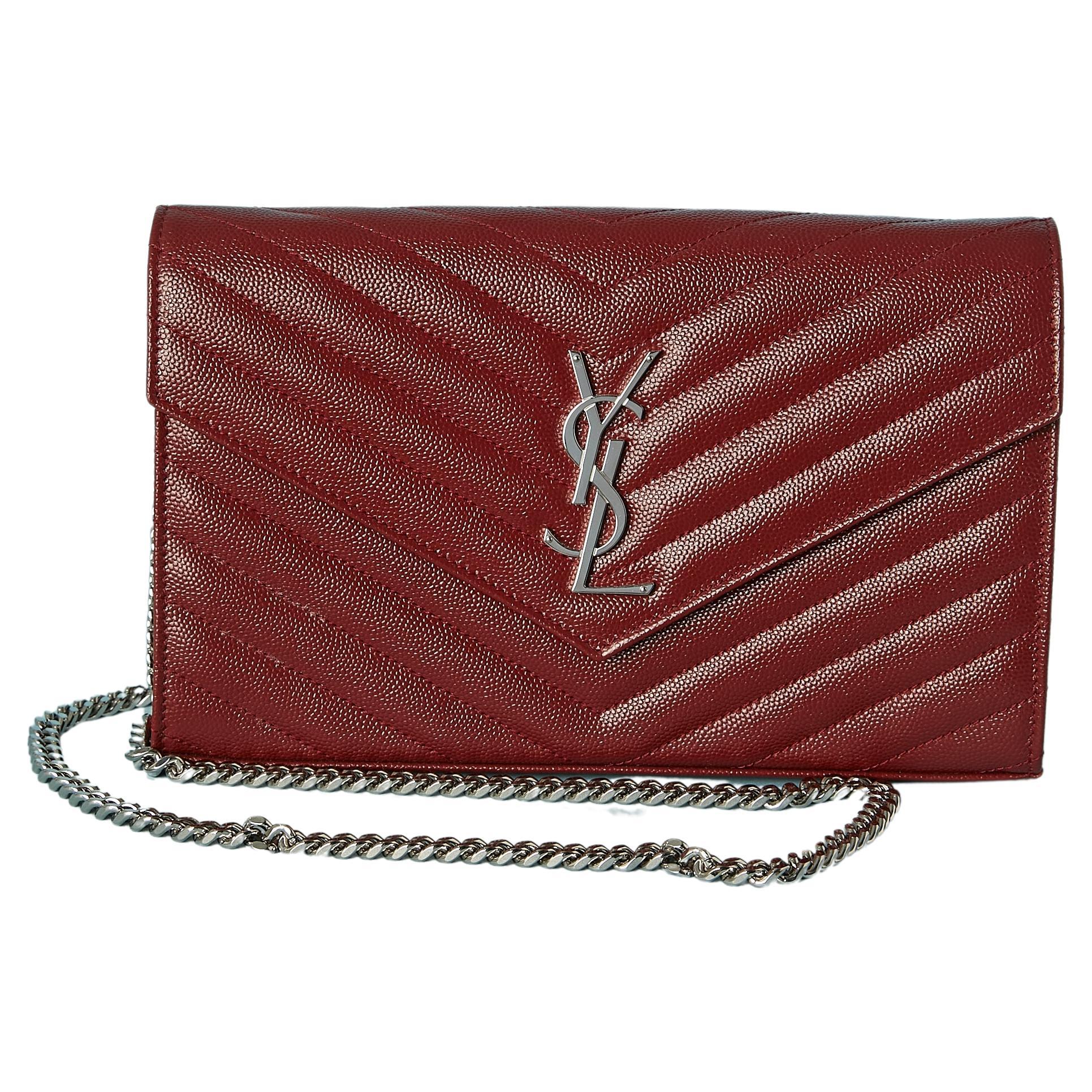 Burgundy grained leather bag with chain shoulder strap Yves Saint Laurent