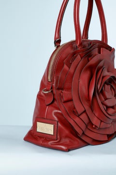 Burgundy hand leather bag with giant rose in leather Valentino Garavani
