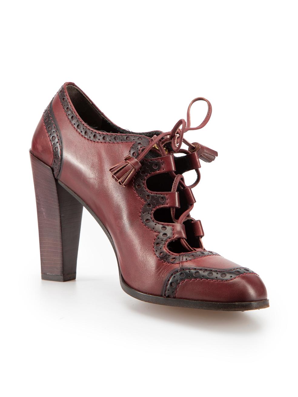 CONDITION is Good. Minor wear to shoes is evident. Light wear to both sides of upper with scratches and marks to the leather on this used Roger Vivier designer resale item. These shoes come with original box and dust